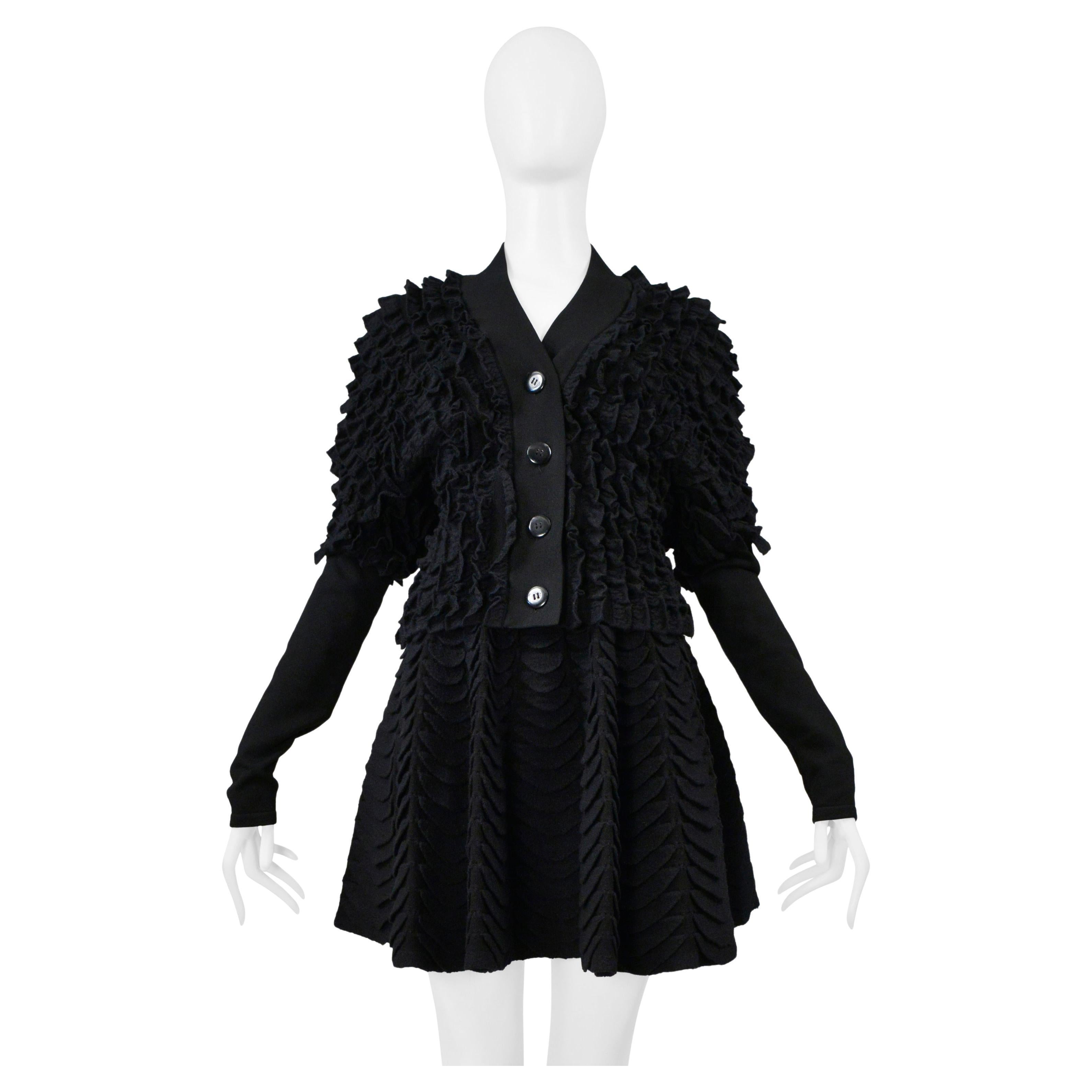 Alaia - Cardigan con volant e gonna a ventaglio in maglia nera in vendita