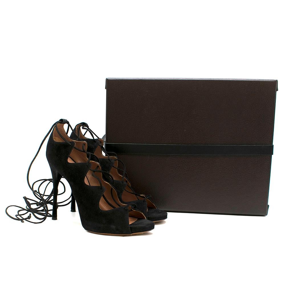 Alaia Black Lace Up Suede Black Heels

- lace-up detail
- Finished with peep toe and front lace up
- Leather shoe laces

Please note, these items are pre-owned and may show some signs of storage, even when unworn and unused. This is reflected within