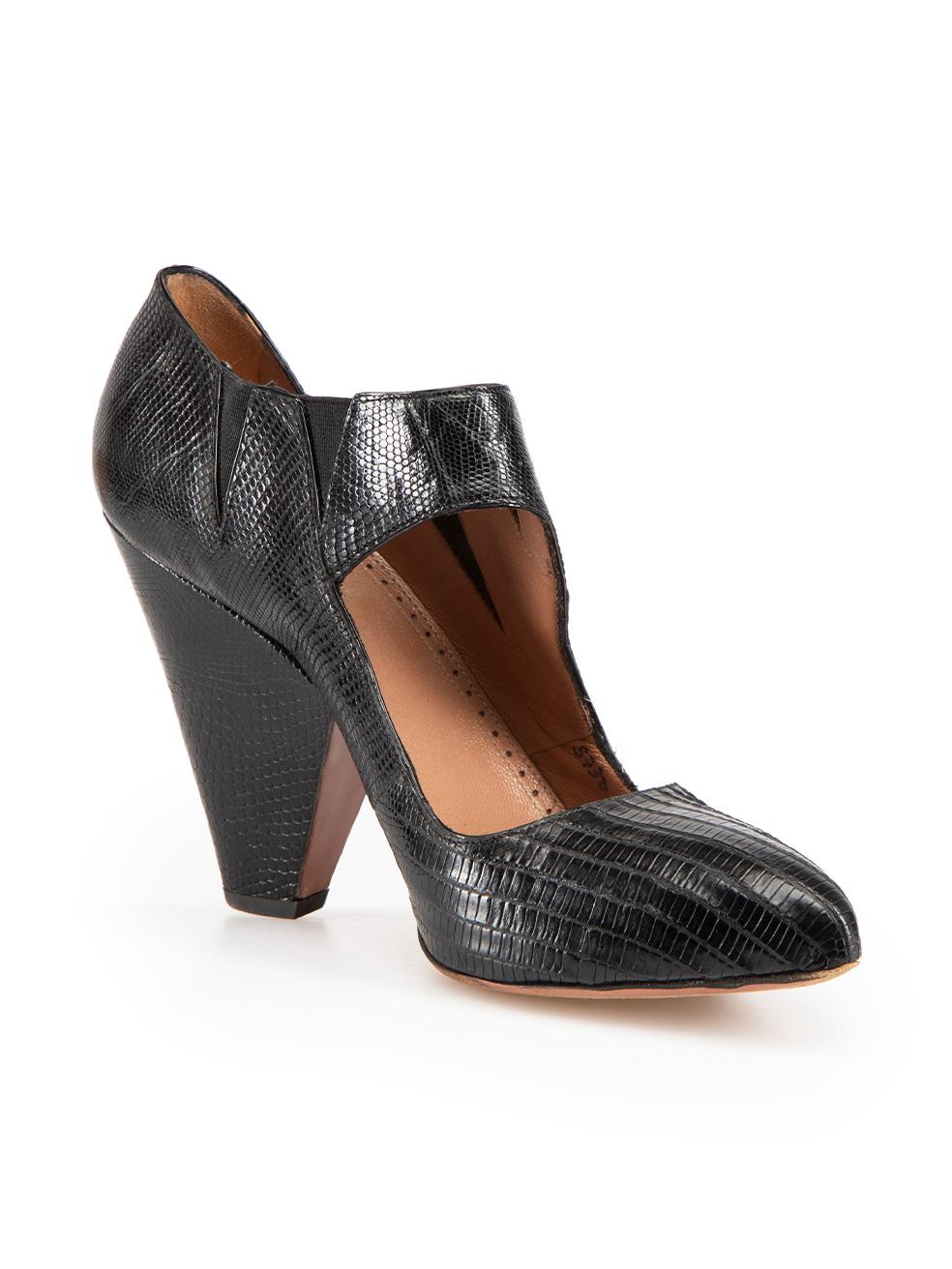 CONDITION is Very good. Minimal wear to heels is evident. Minimal abrasions to back of heel and edge of right shoe on this used Ala√Øa designer resale item. This item comes with original dust bag.
 
Details
Black
Leather
Heels
Lizard embossed
Point