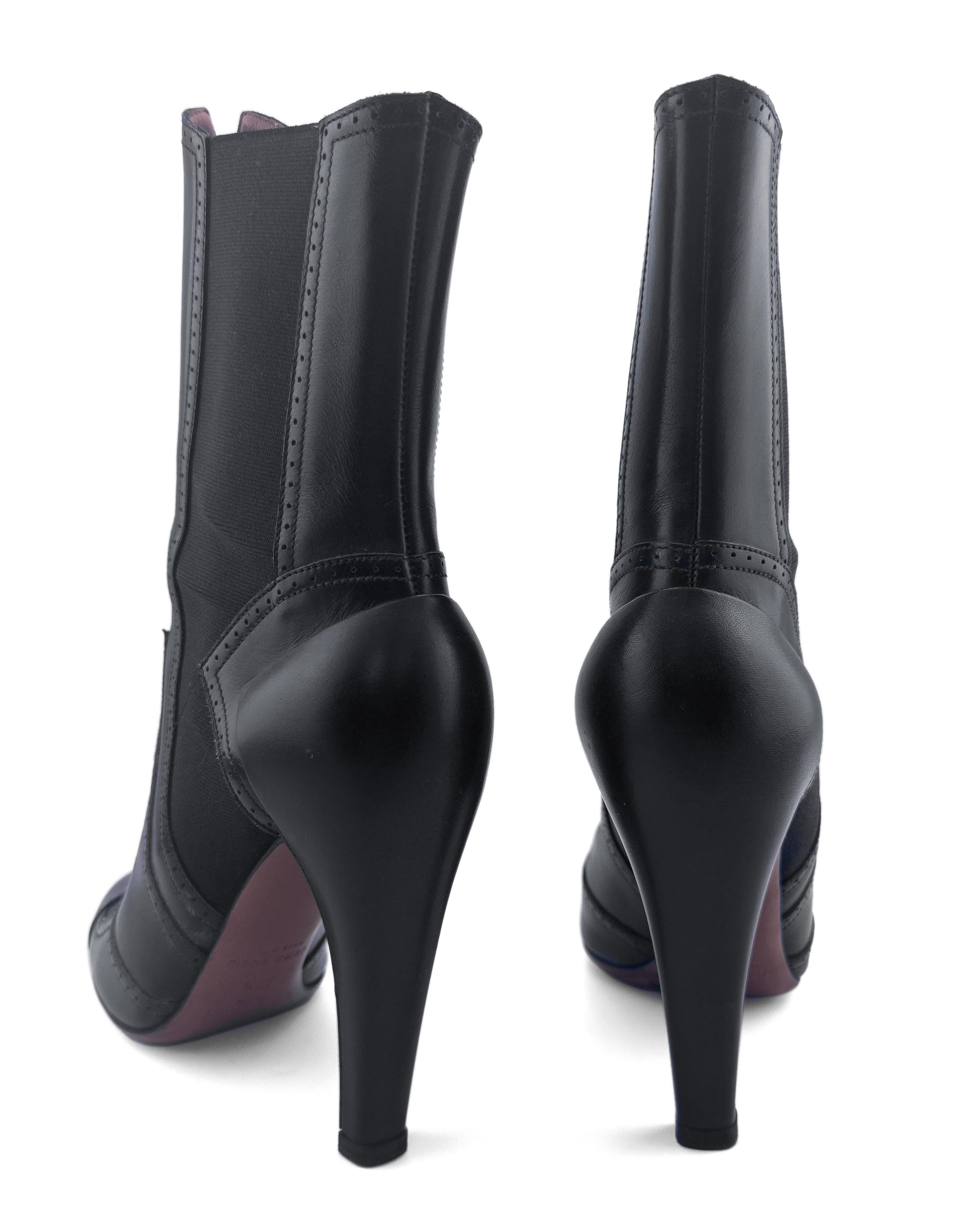 Botines Alaia de piel negra inspirados en los vaqueros del oeste en venta 1