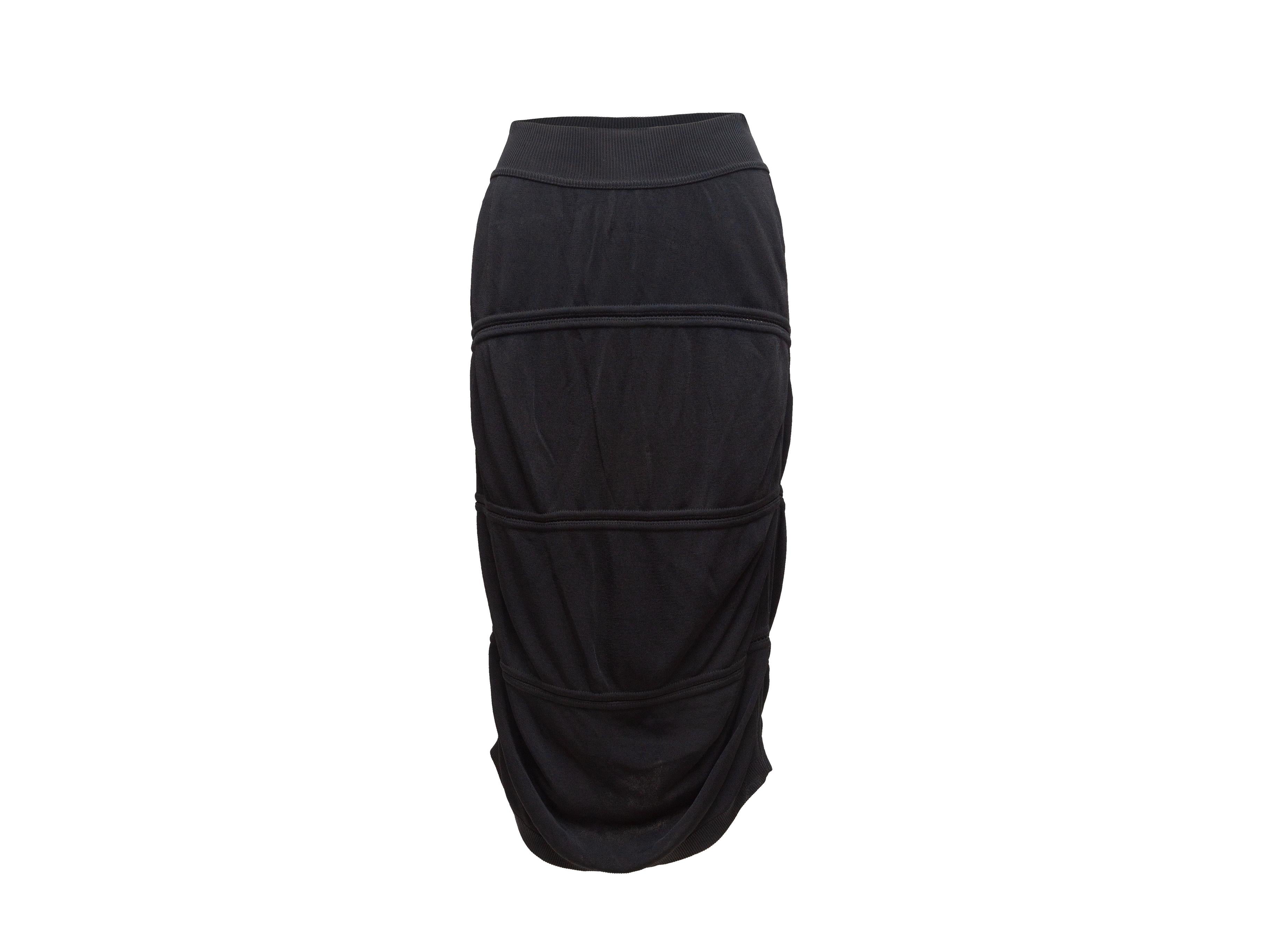 Product details: Vintage black midi skirt by Alaia. 27
