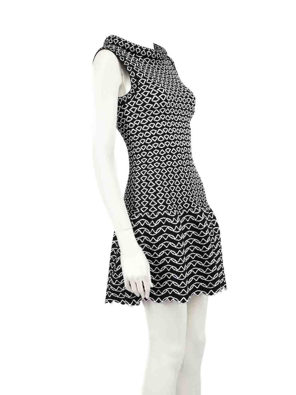 CONDITION is Never worn, with tags. No visible wear to dress is evident on this new Alaïa designer resale item.
 
 
 
 Details
 
 
 Black
 
 Viscose
 
 Knit dress
 
 Abstract pattern
 
 Padded neckline
 
 Side zip fastening
 
 
 
 
 
 Made in Italy
