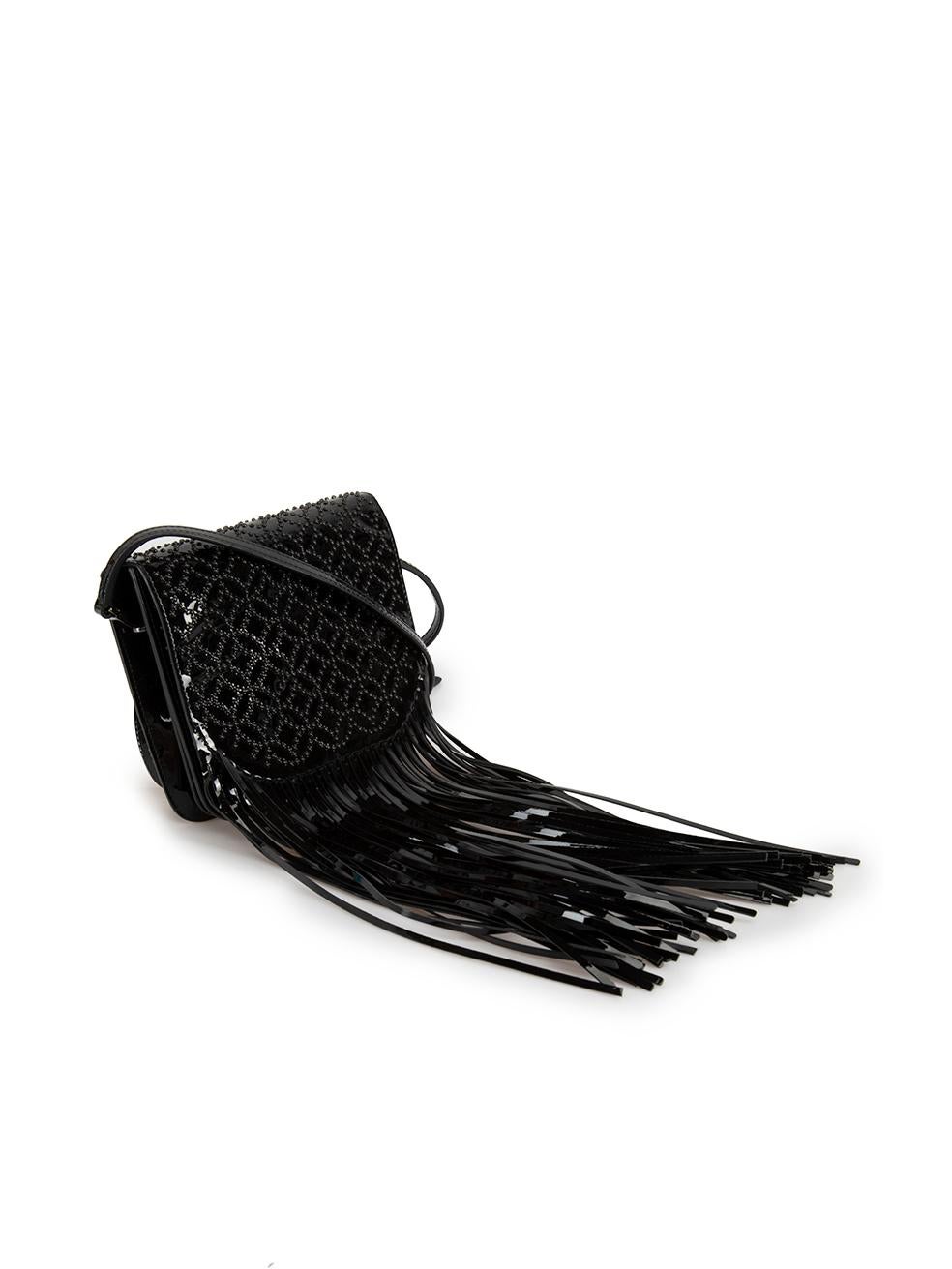 CONDITION is Very good. Hardly any visible wear to bag is evident on this used Ala√Øa designer resale item.

Details
Black
Patent leather
Mini crossbody bag
Detachable and adjustable strap
Flap with magnetic fastening
Fringe detail
Studded arabesque