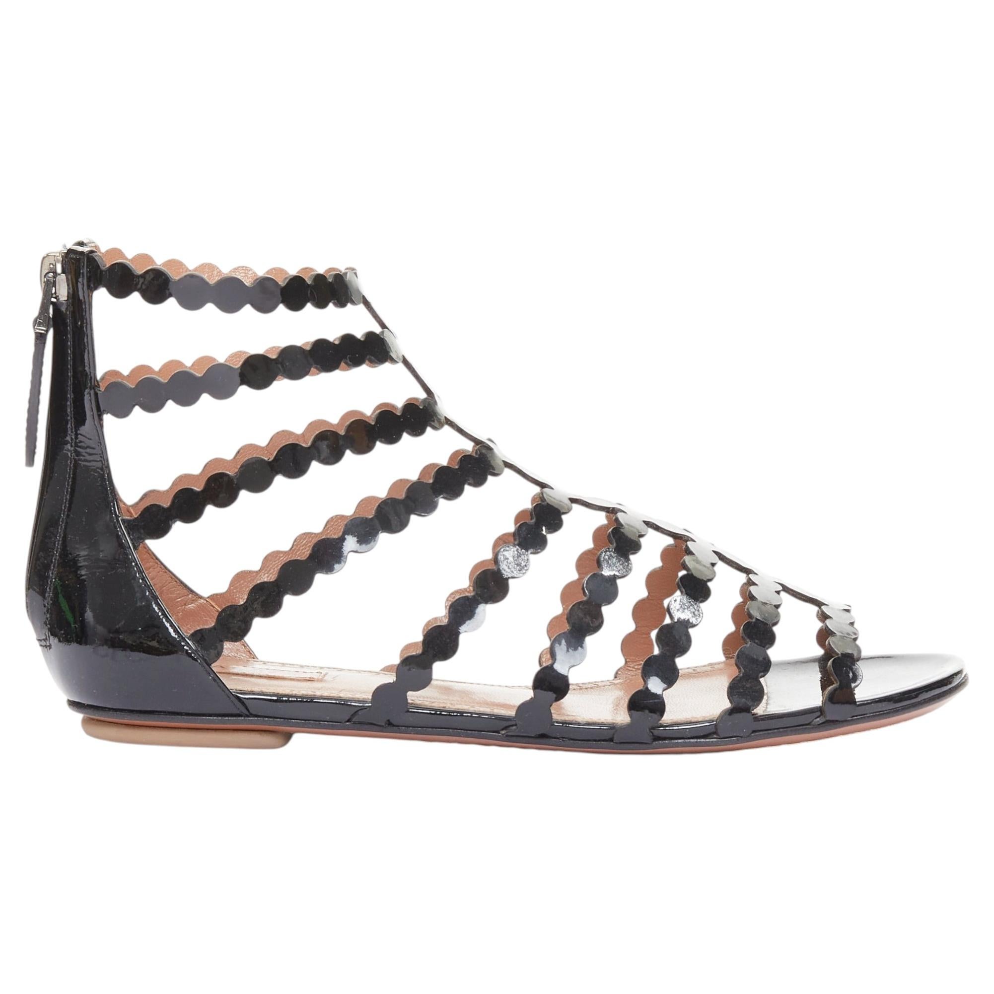 ALAIA black patent leather laser cut scalloped cage gladiator flat sandals EU36