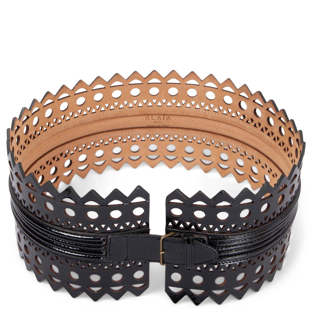100% authentic Alaïa 'Vienne Wave' perforated laser-cut waist belt in black patent-leather with one buckle closure in the middle. Has been worn and is in excellent condition. 

Measurements
Size	80
Width	12cm (4.7in)
Fits	77cm (30in) to 80cm