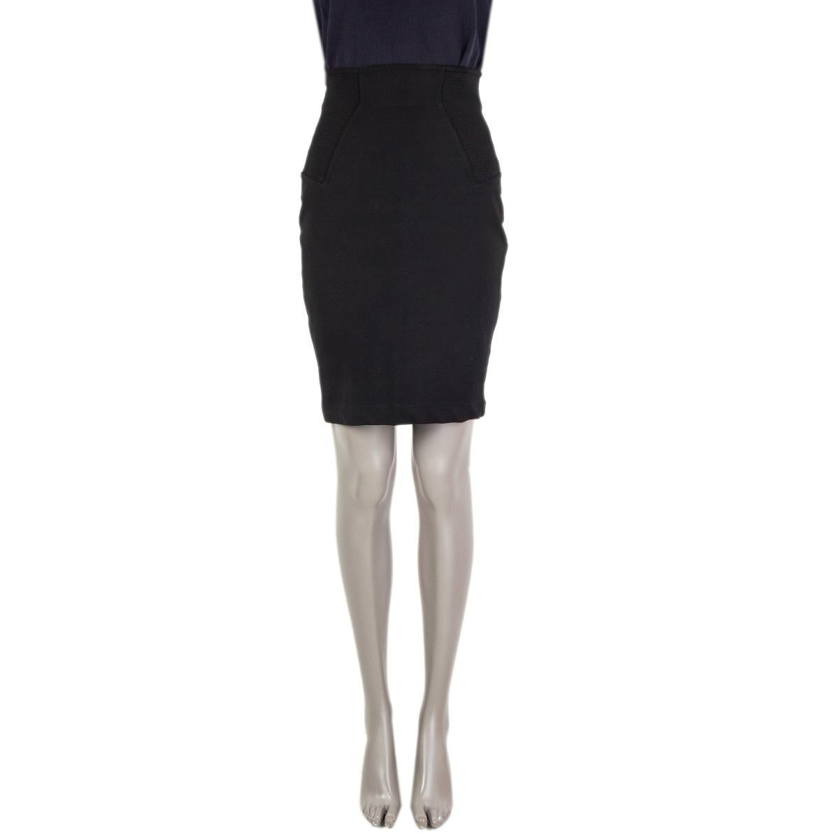 100% authentic Alaia knit pencil skirt in black rayon (85%) and elastane (15%). Is a slip on skirt with a tight-fit. Features rib details on the sides and the back. Has been worn and is in excellent condition.

Measurements
Tag