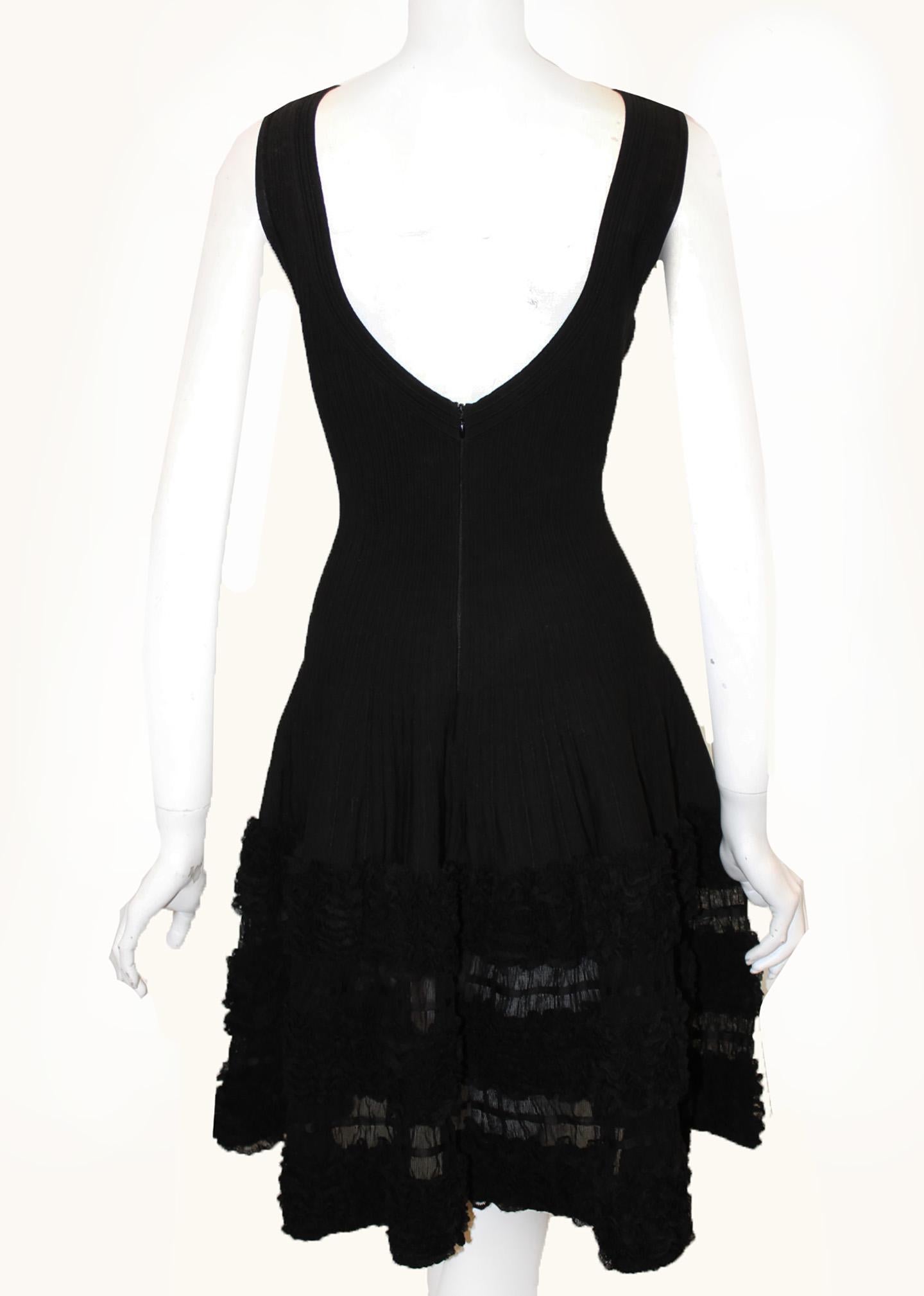 Alaia Black Silk Blend Knit Low Cut Back Lace Ruffle Hem Dress In Excellent Condition In Palm Beach, FL