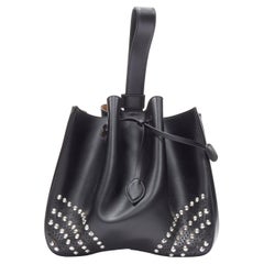 ALAIA black silver spike stud perforated corner drawstring dumpling bag