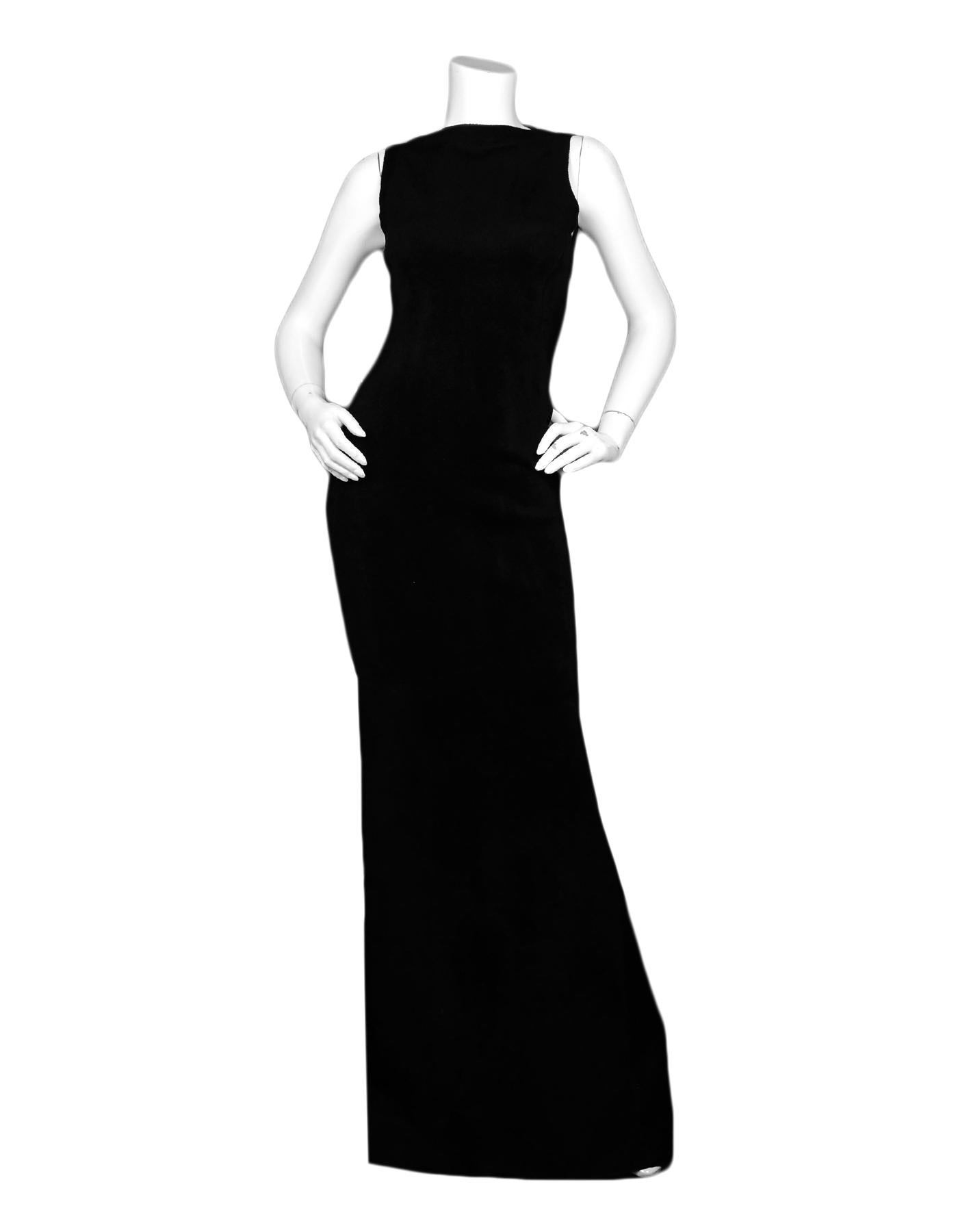Alaia Black Sleeveless Velvet Gown sz FR 38

Made In: Italy
Color: Black
Materials: 35% Fleece Wool, 35% Viscose, 25% Nyon, 5% Polyester
Lining: 35% Fleece Wool, 35% Viscose, 25% Nyon, 5% Polyester
Opening/Closure: Back zip
Overall Condition:
