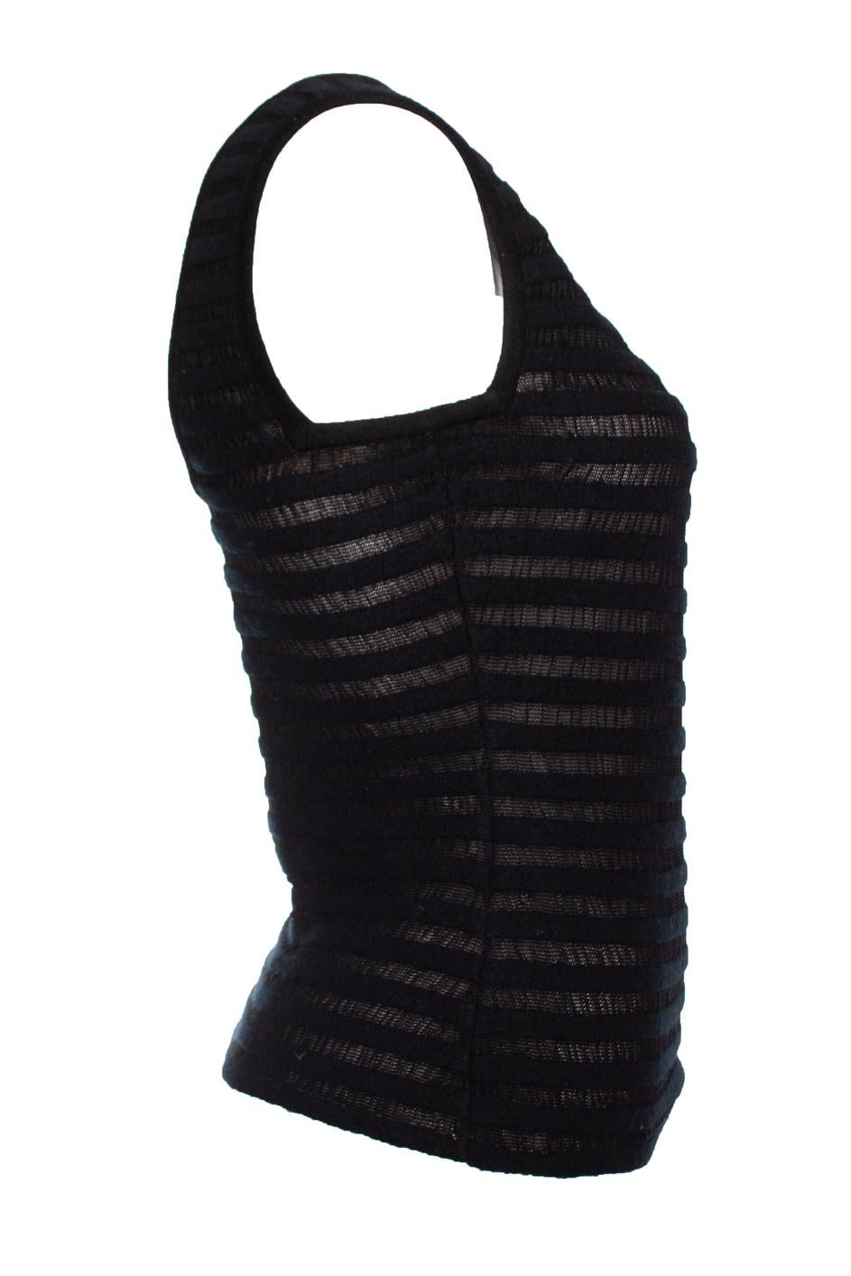 Alaia, black striped semi-transparent top with open back. The item is in very good condition.

• CONDITION: very good condition 

• SIZE: FR42 - L 

• MEASUREMENTS: length 56 cm, width 39 cm, waist 35 cm

• MATERIAL: 45% wool 30% viscose 12% silk 7%