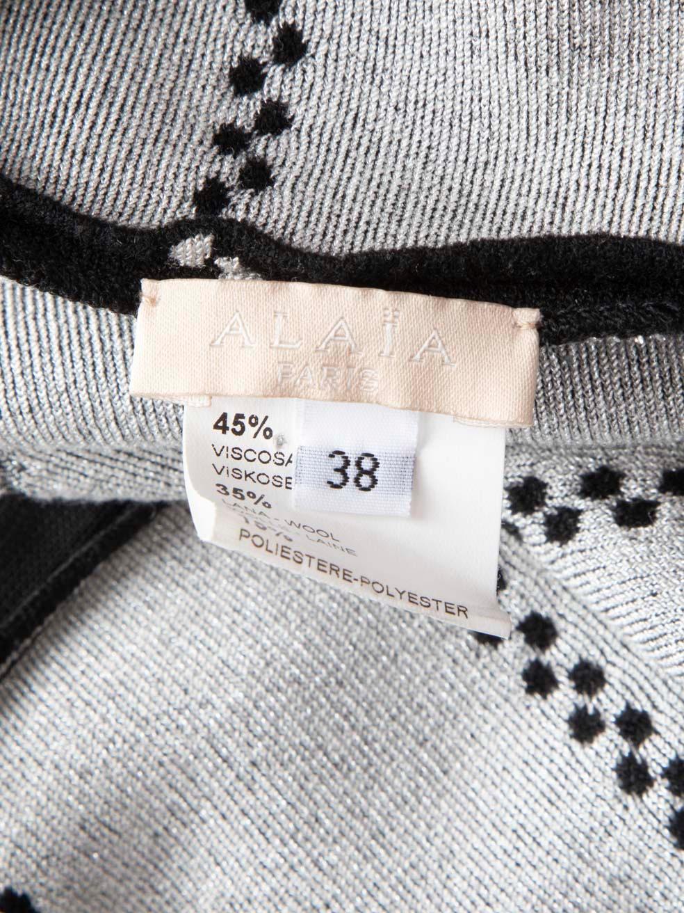Alaïa Schwarzes gestreiftes dehnbares knielanges Kleid Größe M im Angebot 1