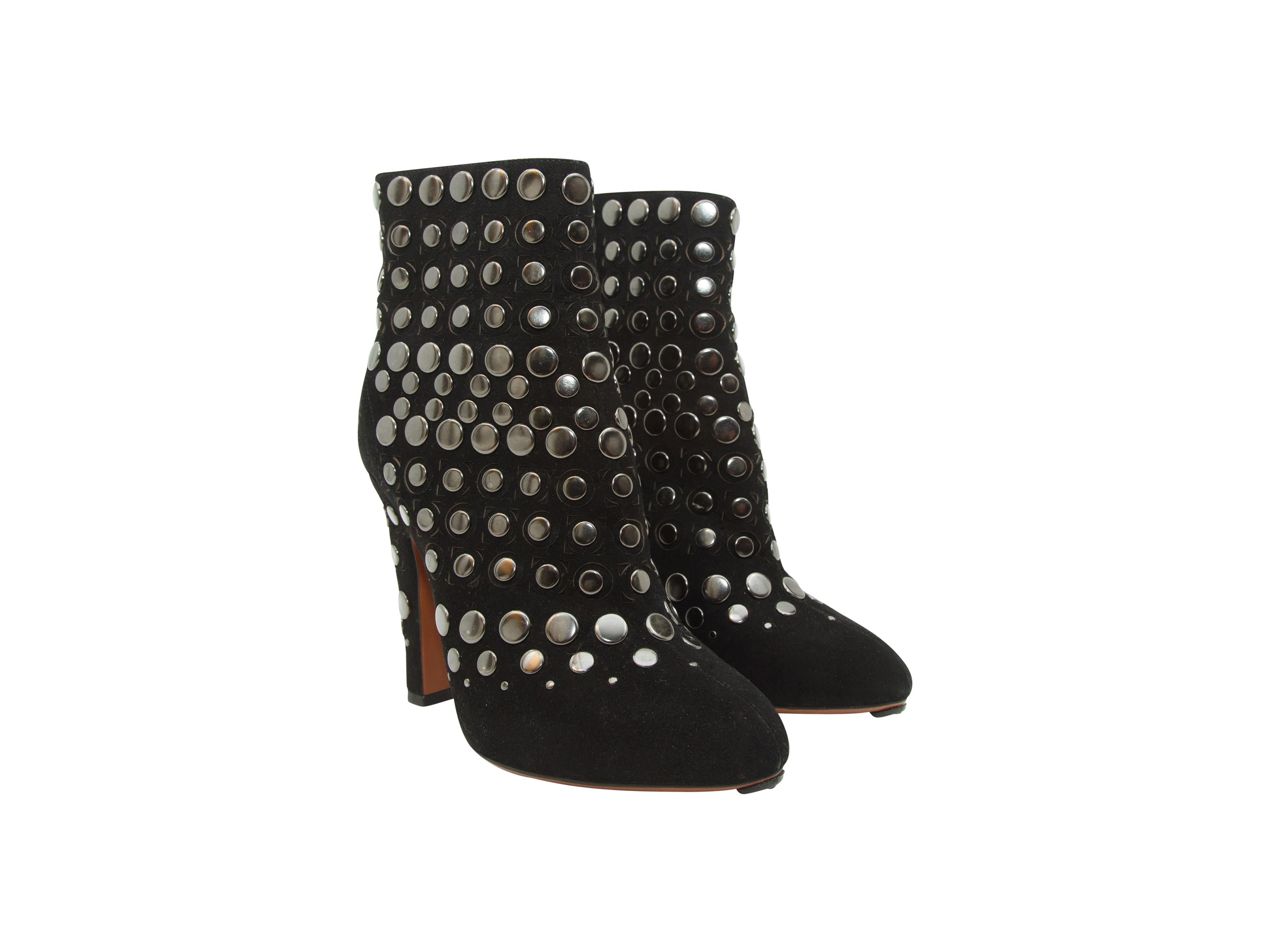 Product details:  Black studded suede ankle boots by Alaia.  Rounded almond toe.  Back zip closure.  Silvertone hardware.  4.5