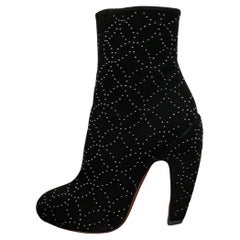 Alaia black suede ankle boots