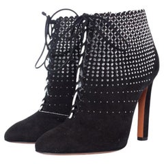 Alaia, Black suede laser-cut boots