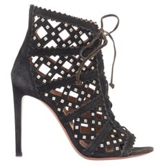 ALAIA black suede laser cut diamond lattice studded cage ankle booties EU35