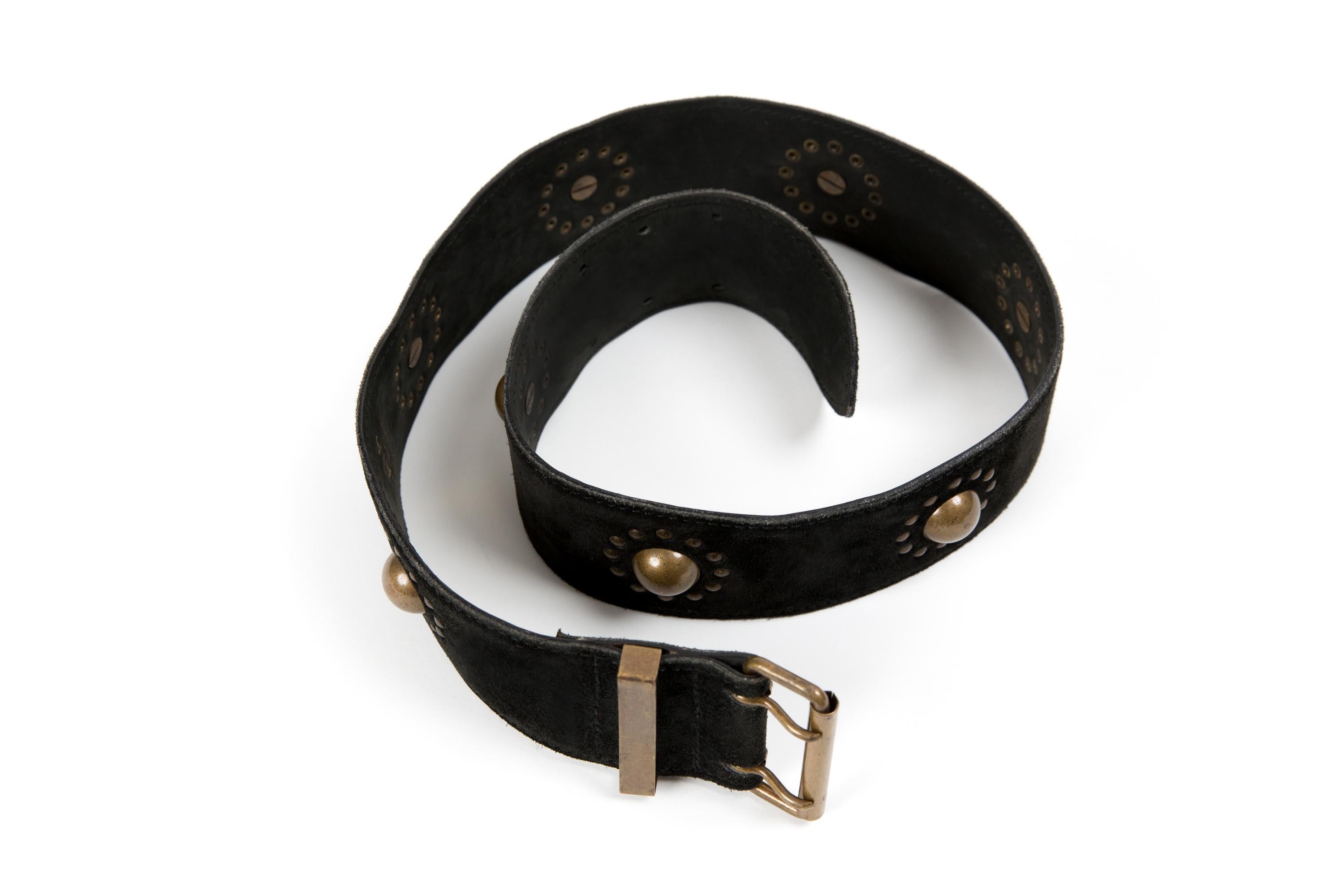 Alaïa black suede leather large belt featuring tarnish gold tone hardware, a large width, studs decorative tarnish gold tone details and an internal logo stamp. 
Circa 1990s.
In good vintage condition. Made in France.
Label size: 80fr
Maxi length