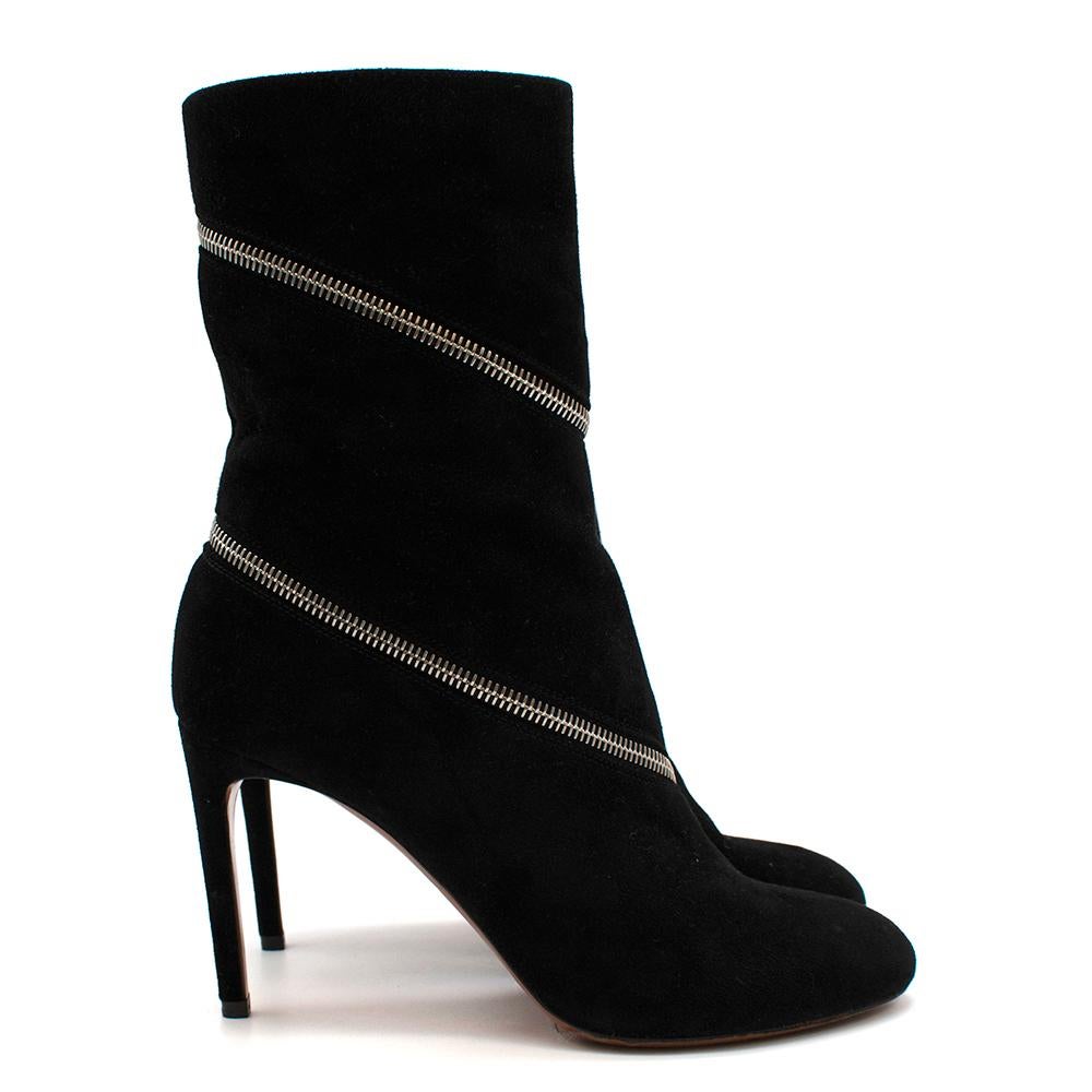 Alaia Black Suede Leather Zipped Heeled Ankle Boots

- Black suede heeled ankle boots 
- Zip fastening that wraps around front and ankle
- Embossed leather zip tag 
- Thin heel 
- Round toe 

Materials:
Outer - 100% Leather 
Lining - 100% Leather