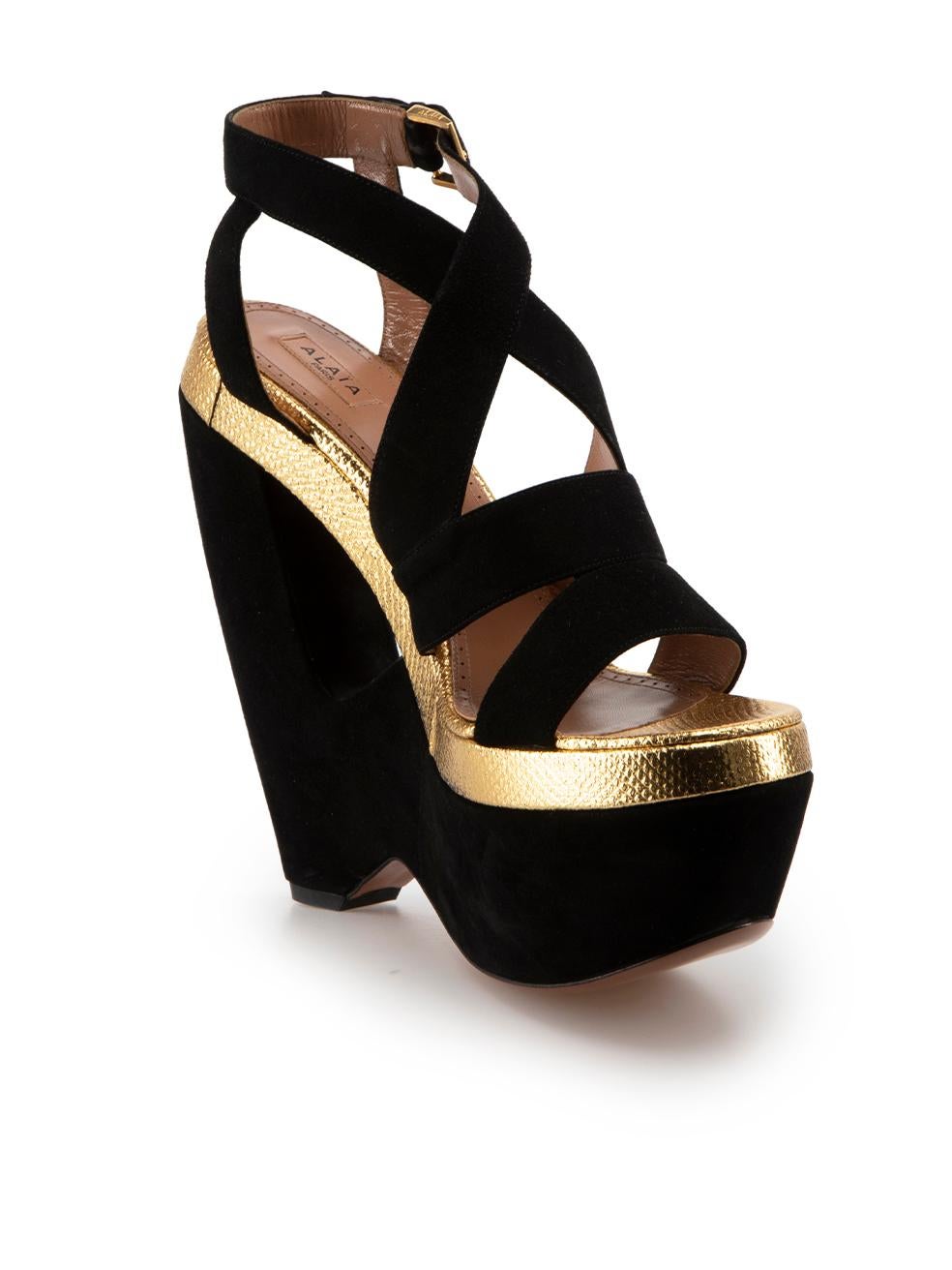 CONDITION is Never Worn. No visible wear to wedges is evident on this used Alaïa designer resale item. Comes in original box with dust bag.

Details
Black
Suede
Wedge sandals
Platform
Gold lizard skin detail
High heeled
Strappy
Cut out wedge
Open