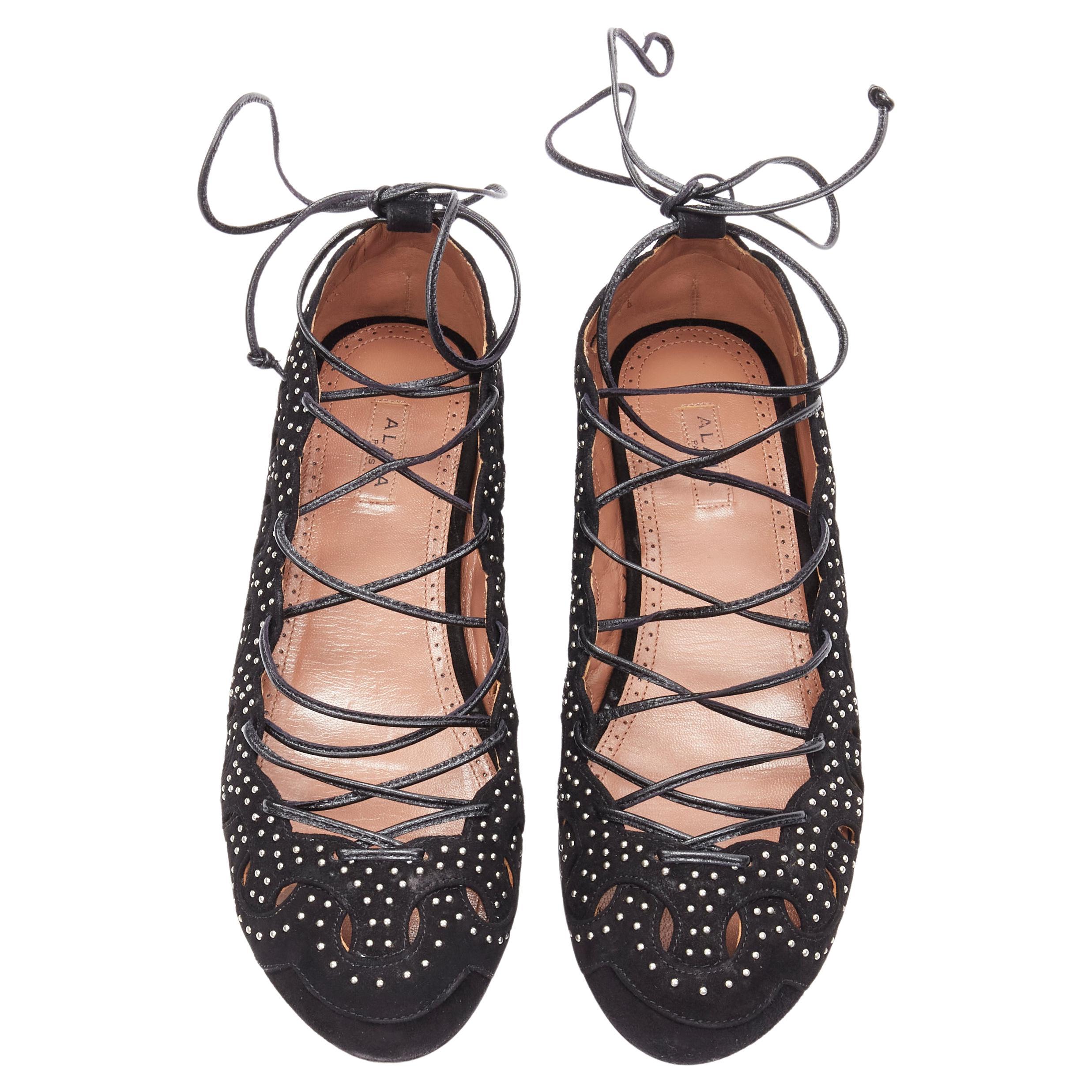 ALAIA black suede silver studed circle cut out lace up ballerina flats EU37 
Reference: MELK/A00226 
Brand: Alaia 
Designer: Azzedine Alaia 
Material: Suede 
Color: Black 
Pattern: Solid 
Closure: Lace Up 
Made in: Italy 

CONDITION: 
Condition: