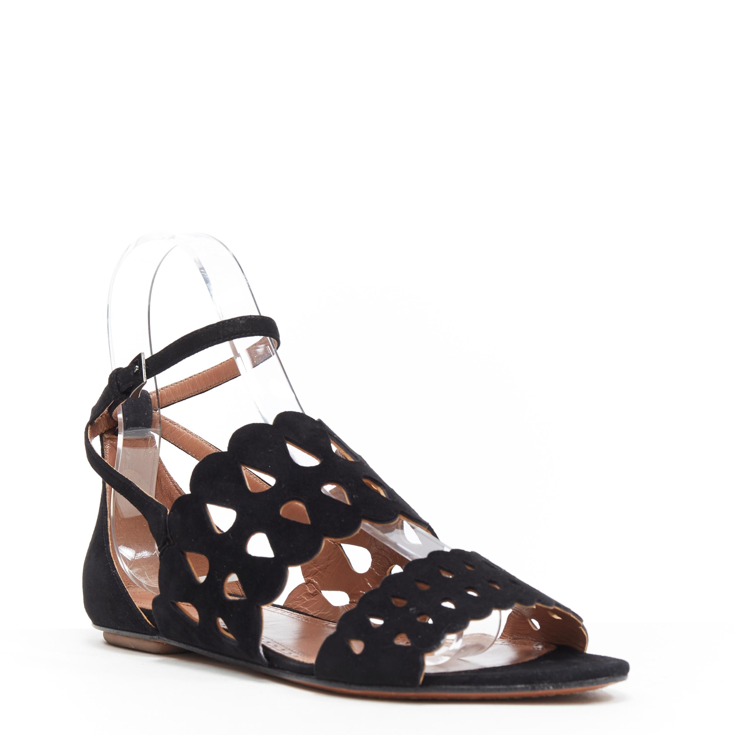 ALAIA black suede squiggly cut out strap open toe ankle wrap flat sandals EU37
Brand: Alaia
Designer: Azzedine Alaia
Model Name / Style: Suede sandals
Material: Suede
Color: Black
Pattern: Solid
Closure: Ankle strap
Lining material: Leather
Extra