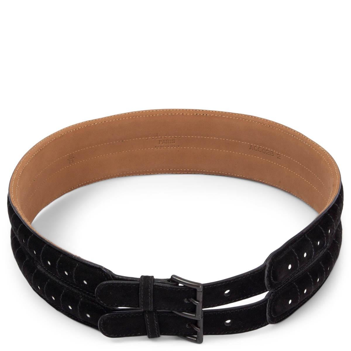 100% authentic Alaïa double strap waist belt in black suede leather with white cut-out dots. The design features gunmetal buckles. Has been worn and is in excellent condition. 

Measurements
Tag Size	75
Width	6cm (2.3in)
Fits	71cm (27.7in) to 76cm