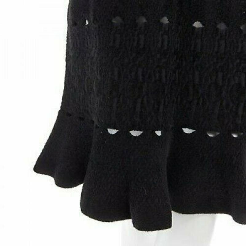 ALAIA black textured chenille cutout fluted hem bodycon dress US8 UK12 IT44 FR40
Reference: TGAS/A00506
Brand: Alaia
Designer: Azzedine Alaia
Material: Cupro
Color: Black
Pattern: Solid
Extra Details: Black Chenille. Cut out details. Fit flare