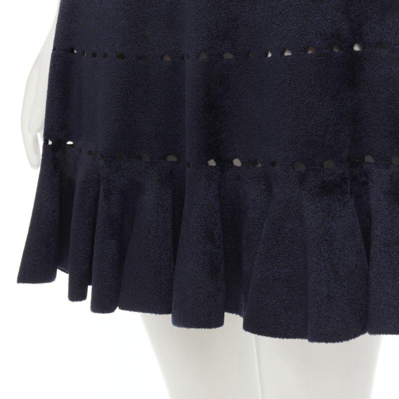 ALAIA black velour geometric cut out flared hem skirt FR38 M
Reference: LNKO/A01965
Brand: Alaia
Designer: Azzedine Alaia
Material: Velour
Color: Black
Pattern: Solid
Extra Details: Stretch fit. Cut out detailing. Flared skirt.
Made in: