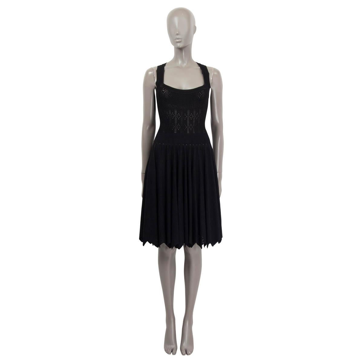 100% authentic Alaïa sleeveless flared dress in black viscose (85%), polyester (10%) and polyamide (5%). Features square neckline and scalloped hem. Opens with a zipper on the back. Has been worn and is in excellent condition. 

Measurements
Tag