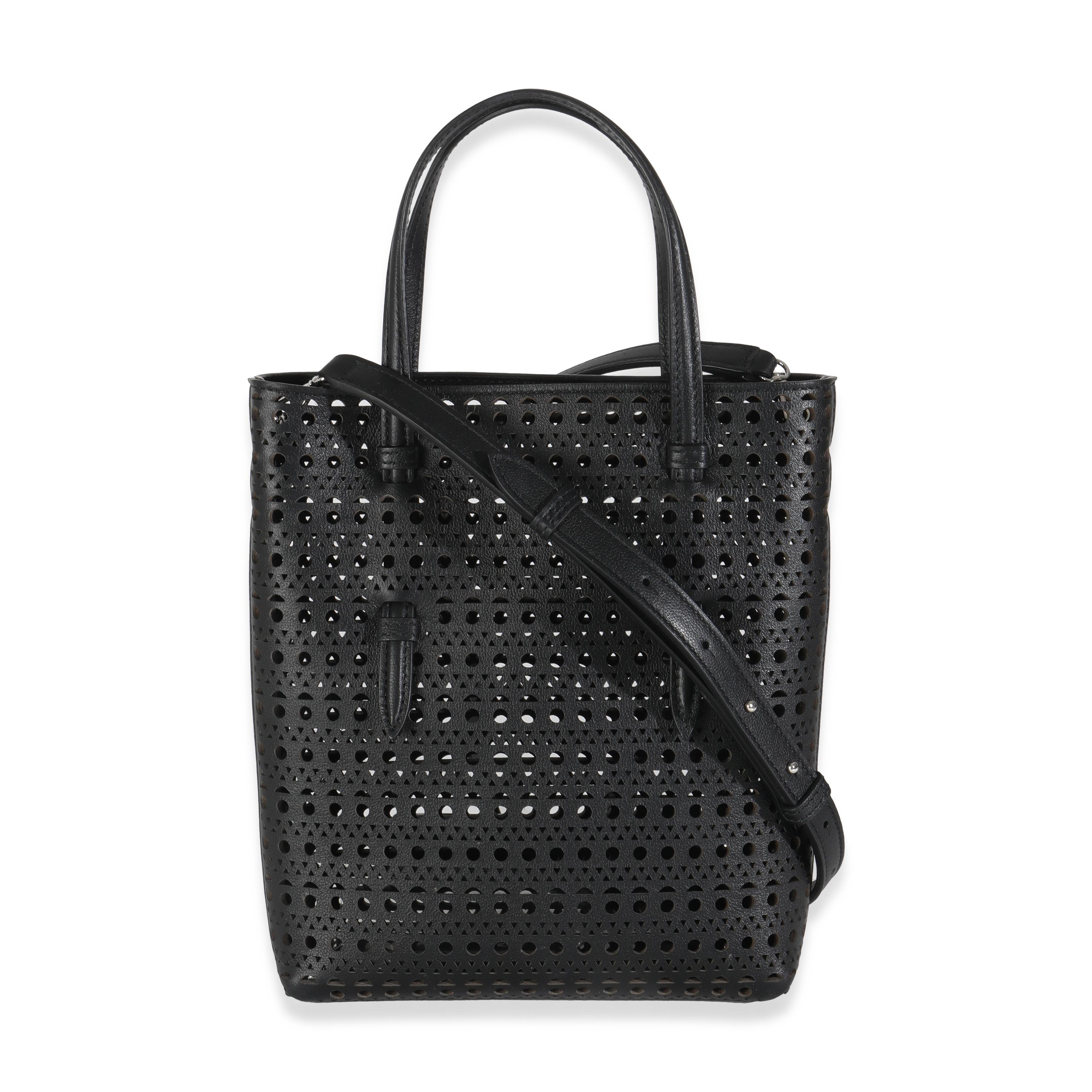 Listing Title: Alaia Black Vivienne Calfskin Laser Cut Mina North South Tote
SKU: 144687
MSRP: 1750.00 USD
Condition: Pre-owned 
Handbag Condition: Pristine
Condition Comments: Item has no indication of wear.  Final sale.
Brand: Alaia
Model: Mina
