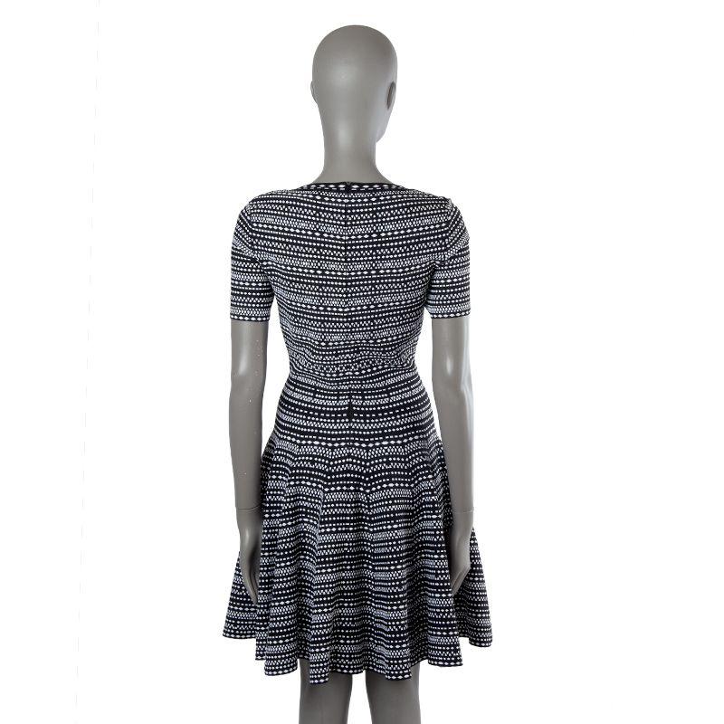 Alaia knit flared dress in black and white viscose (82%), polyester (10%), nylon (6%) and elastane (2%). Opens with zipper on the back. Unlined. Has been worn and is in excellent condition.

Tag Size 40
Size M
Shoulder Width 38cm (14.8in)
Bust 76cm