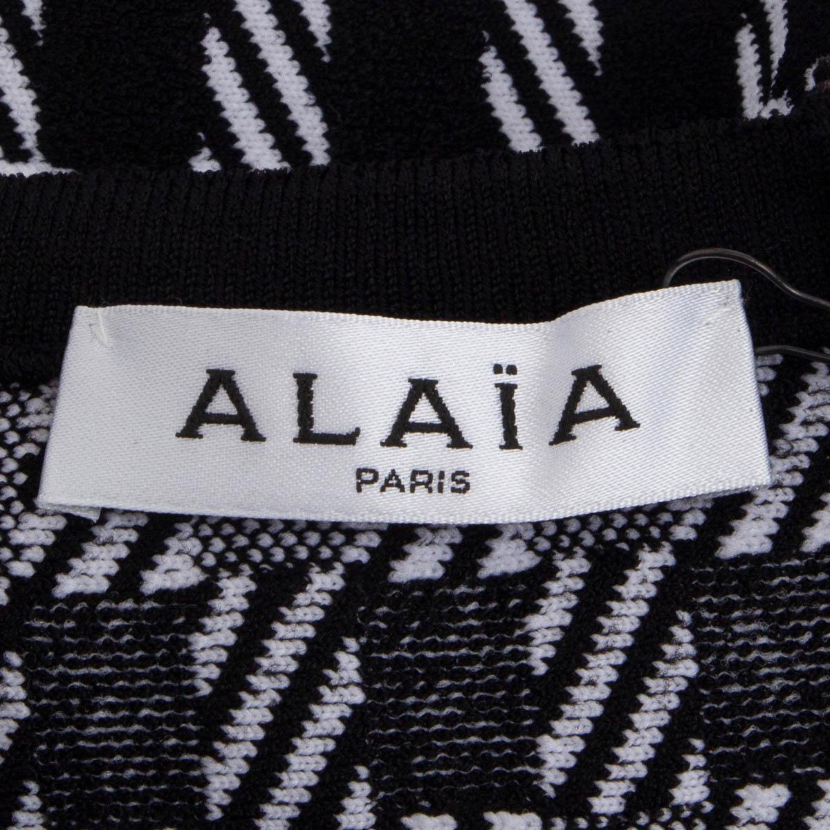 ALAIA HOUNDSTOOTH MERMAID MINI Kleid aus schwarzem und weißem Viskose 36 XS im Zustand „Hervorragend“ im Angebot in Zürich, CH