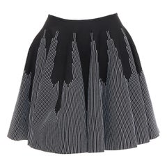 ALAIA falda skater acampanada de cintura alta en mezcla de lana negra y blanca FR38 M