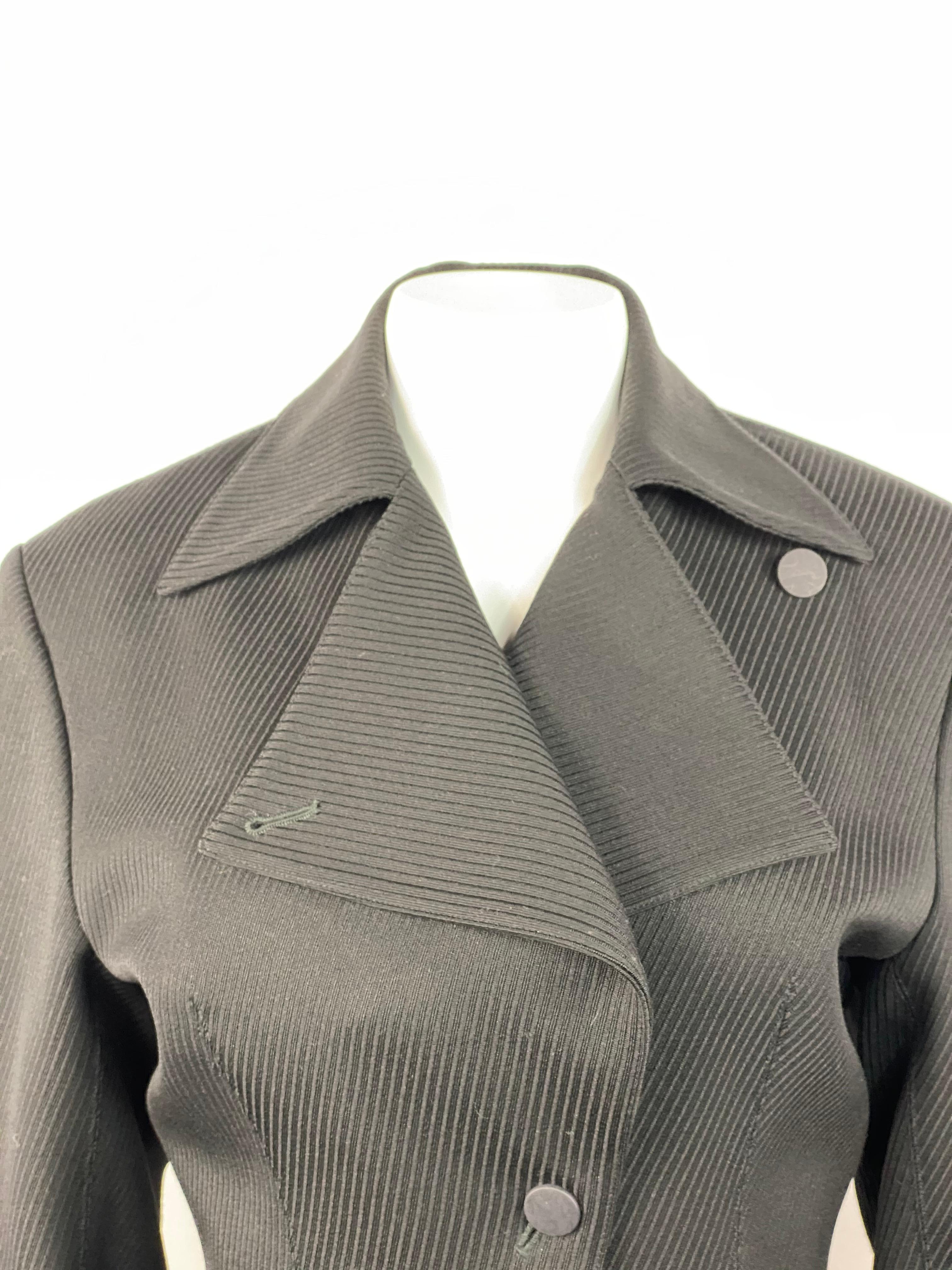 Alaia Black Wool Blazer Jacket Size 38

Product details:
Size 38/ 6
Featuring striped pattern
Three front buttons closure
Two front pockets
Three buttons on the bottom of the sleeves