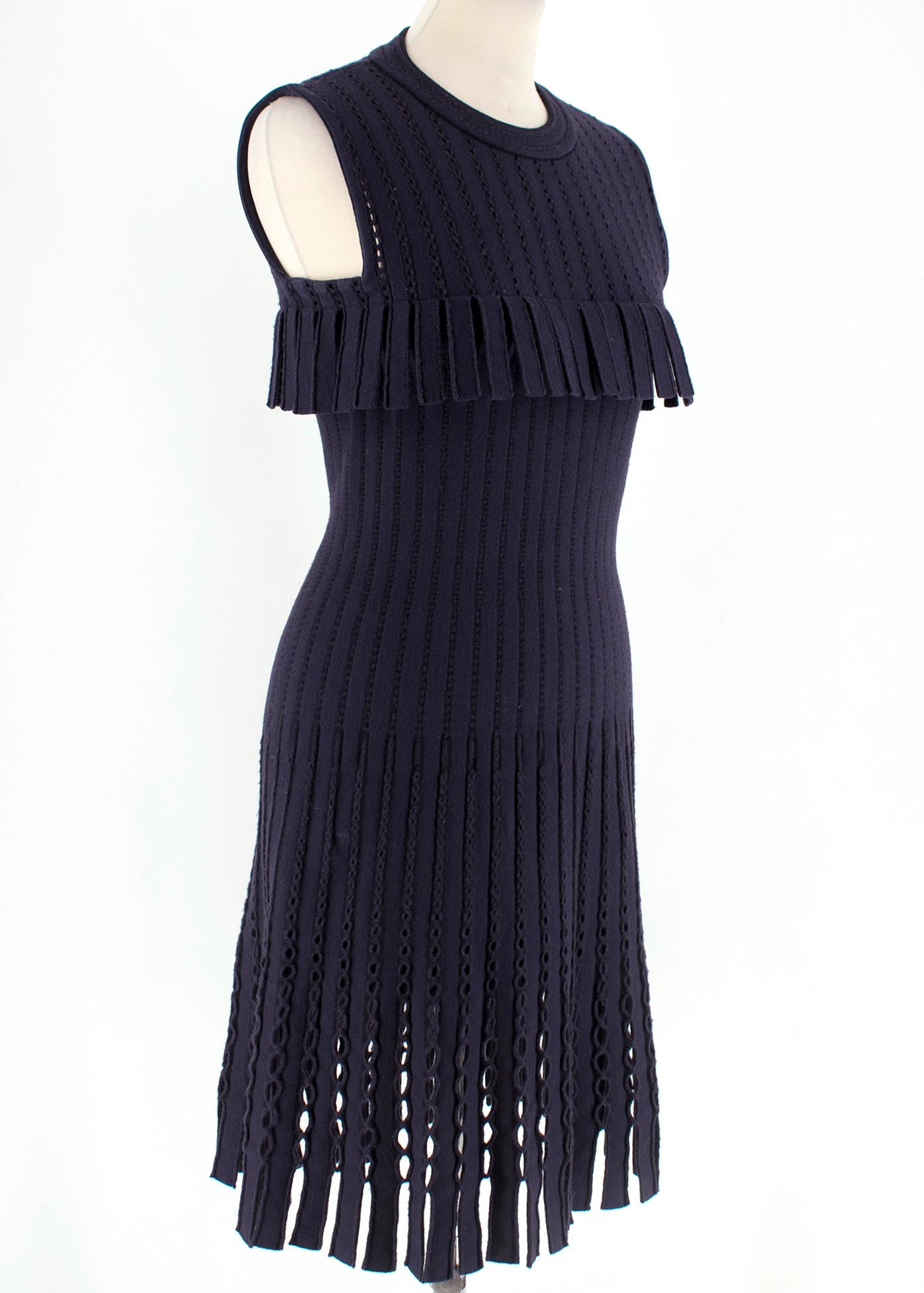 Alaia Navy/black striped wool dress. Featuring cut out and fringe details.  RRP £1775.00

- Mid-weigth knit 
- Body con stretch fit
- Loose at the hip
- Concealed back zip closure
- 70% Fleece Wool, 20% Polyamide, 10% Polyester
- Made in Italy
- Dry