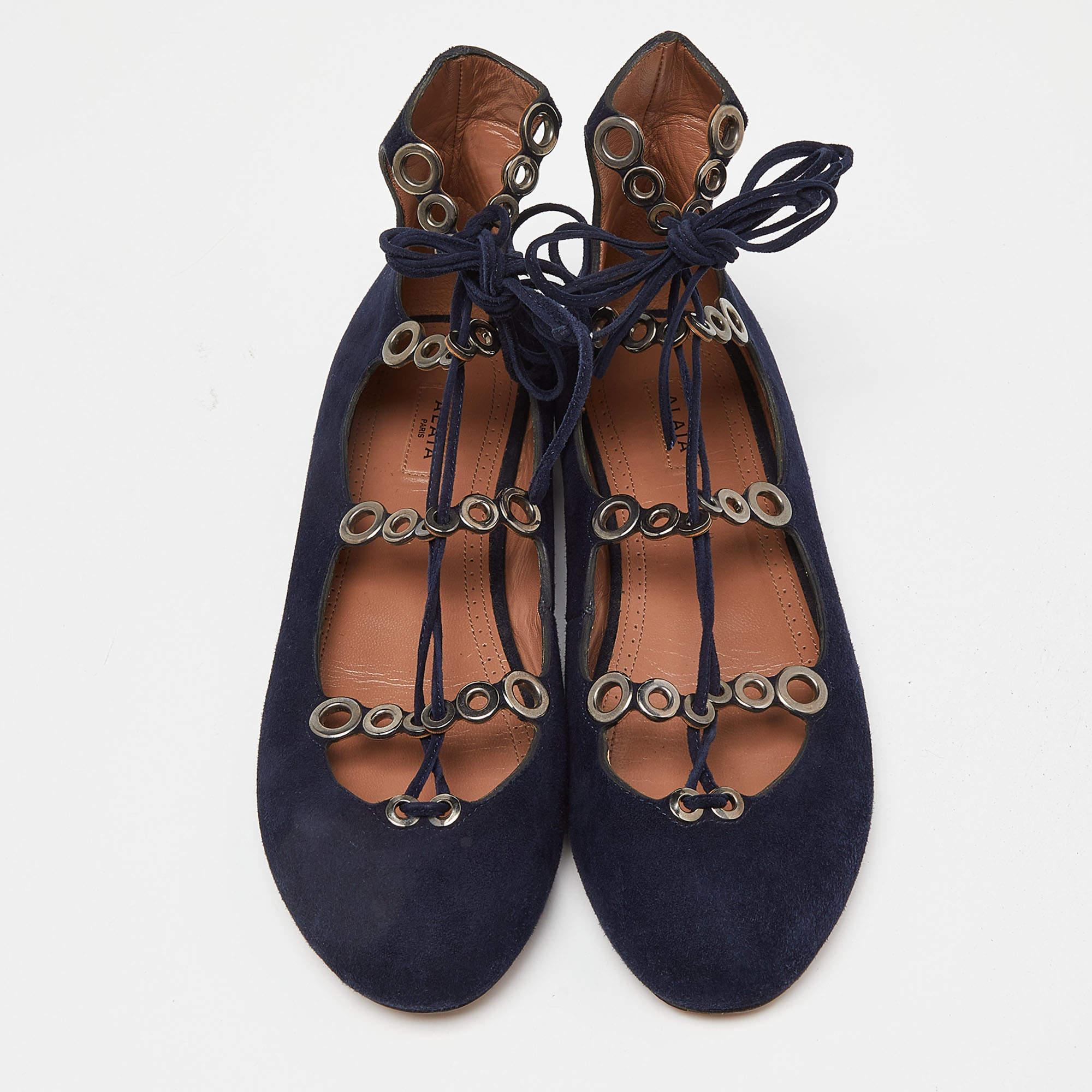 These designer ballet flats by Alaia will instantly make you feel in style. Classy in blue, this pair is crafted from suede. Lace-up details and little bows are added to complete the lovely design. Keep it light and casual with this cute pair.

