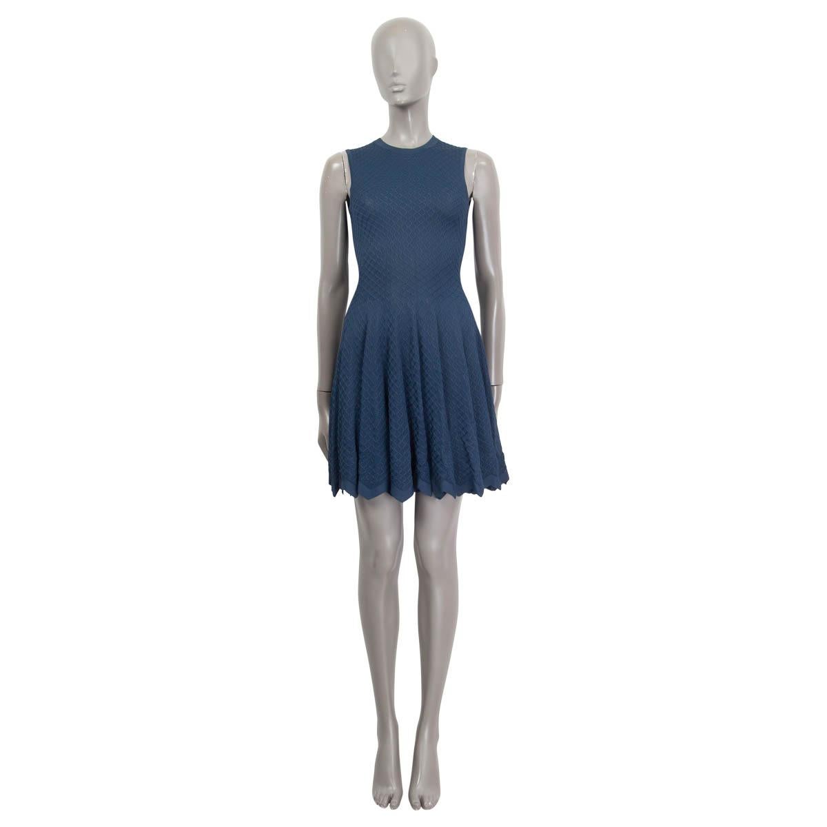 100% authentic Alaia fishnet knit dress in blue viscose (100%). Features a zigzag hemline. Opens with a concealed zipper on the back. Unlined. Has been worn and is in excellent condition.

Measurements
Tag Size	36
Size	XS
Shoulder Width	30cm