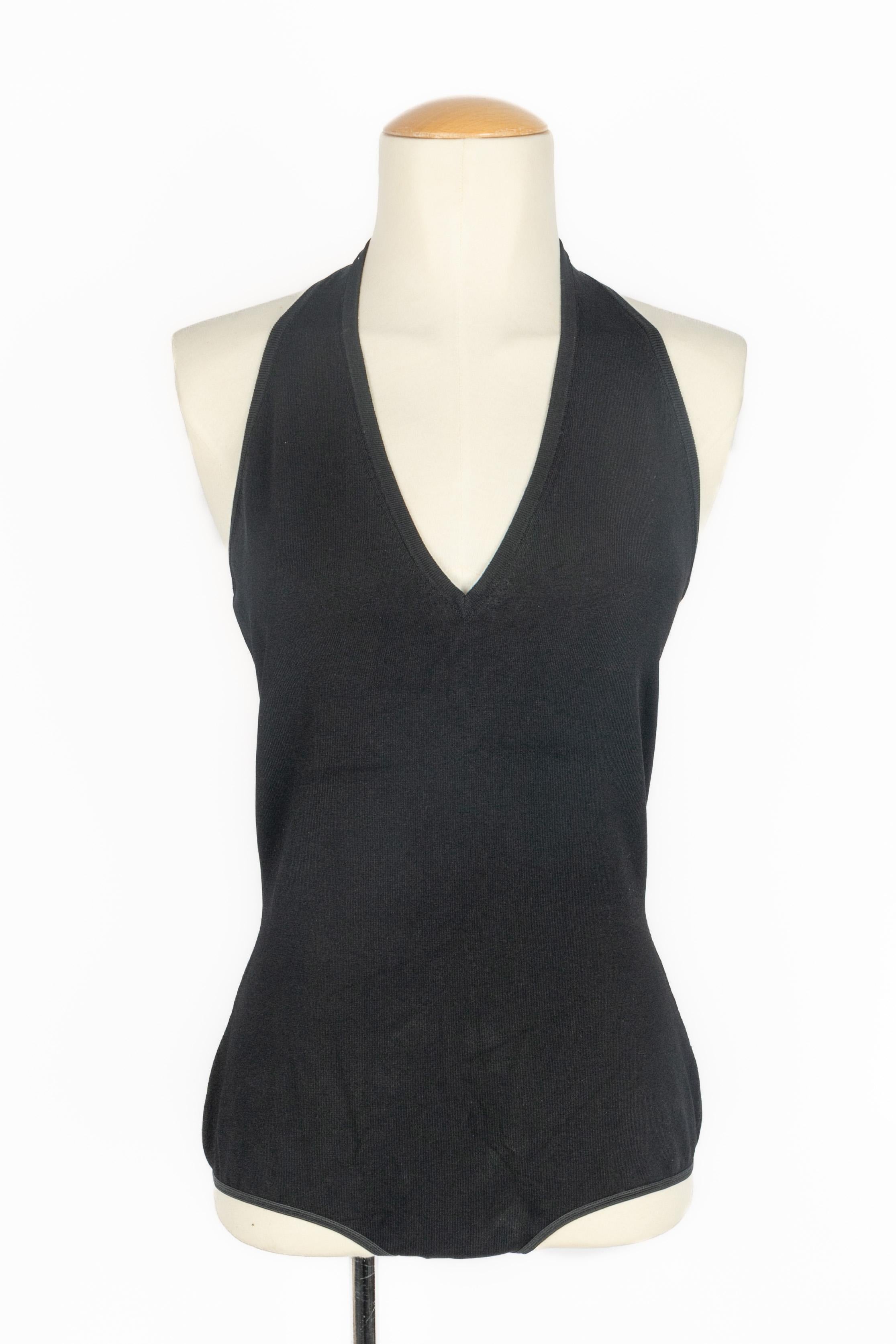 ALAÏA - (Fabriqué en Italie) Body noir stretch à dos ouvert et encolure en V. Taille 40FR indiquée.

Condit :
Bon état

Dimensions :
Tour de poitrine : 43 cm - Tour de taille : 34 cm - Tour de hanches : 42 cm - Longueur : 70 cm

SKU:FH53