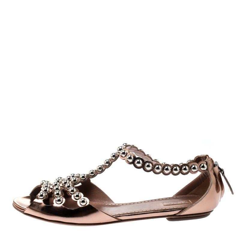 These beautiful leather flats are a perfect option while choosing footwear for any occasion. The sandals are designed to offer the best ease, fit and are absolute head-turners in any crowd. This pair from Alaia feature studs on the T strap layout