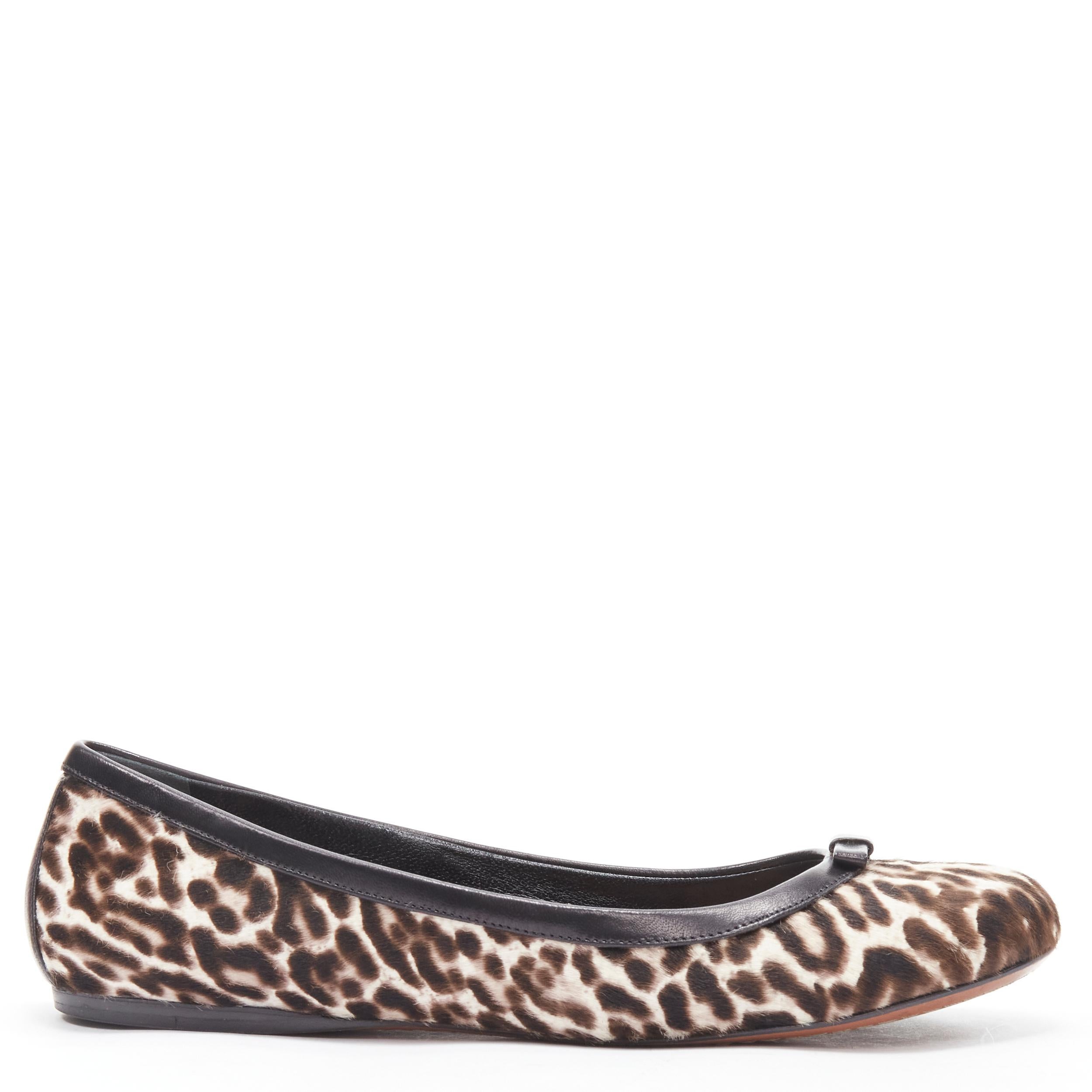 ALAIA brown leopard spot print pony hair black bow trim ballet flats EU37.5 
Reference: MELK/A00227 
Brand: Alaia 
Designer: Azzedine Alaia 
Material: Leather 
Color: Brown 
Pattern: Leopard 
Made in: Italy 

CONDITION: 
Condition: Excellent, this