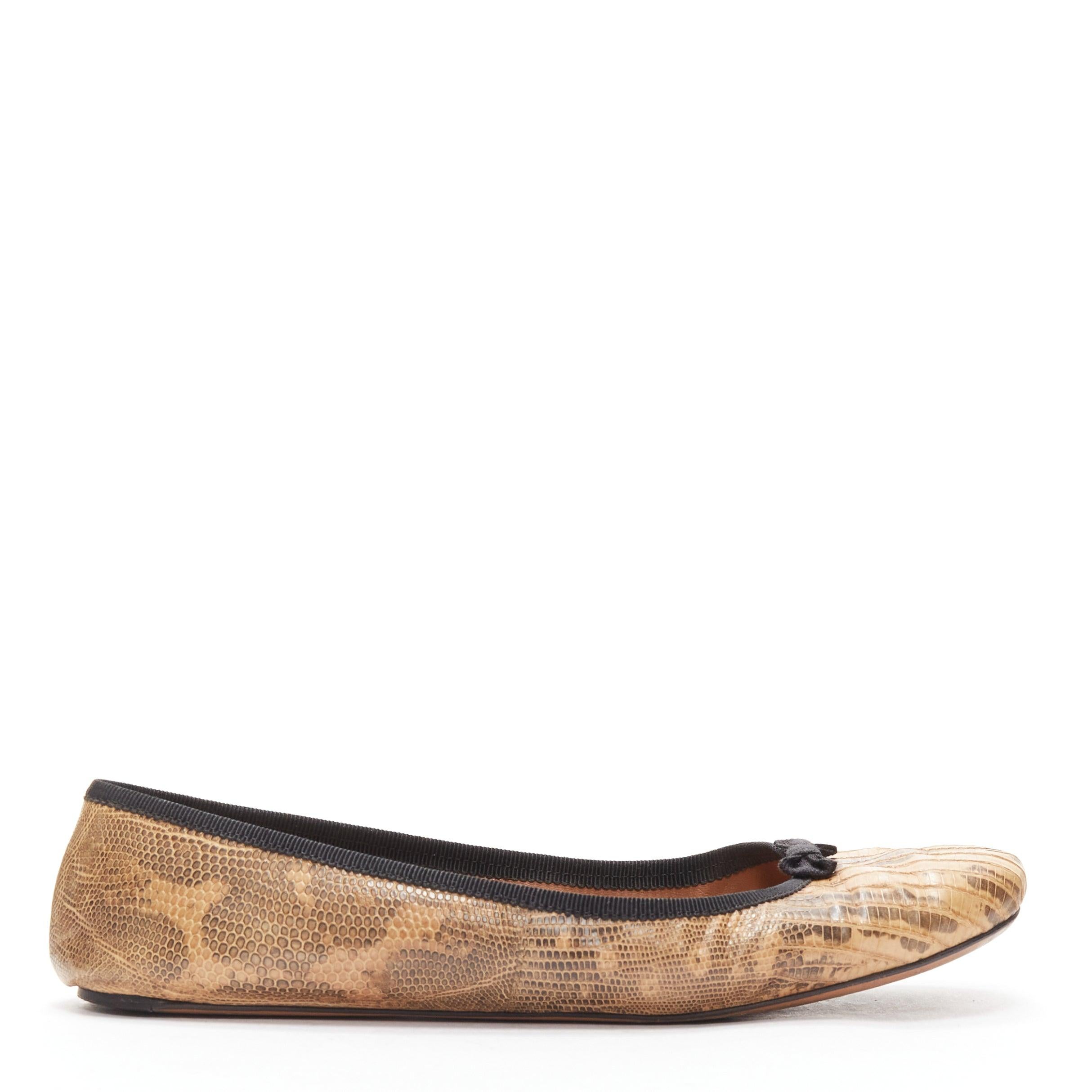 ALAIA brown scaled leather black bow trim ballerina flats shoes EU37
Reference: SNKO/A00371
Brand: Alaia
Material: Leather, Fabric
Color: Brown, Black
Pattern: Animal Print
Closure: Slip On
Lining: Brown Leather
Made in: Italy

CONDITION:
Condition: