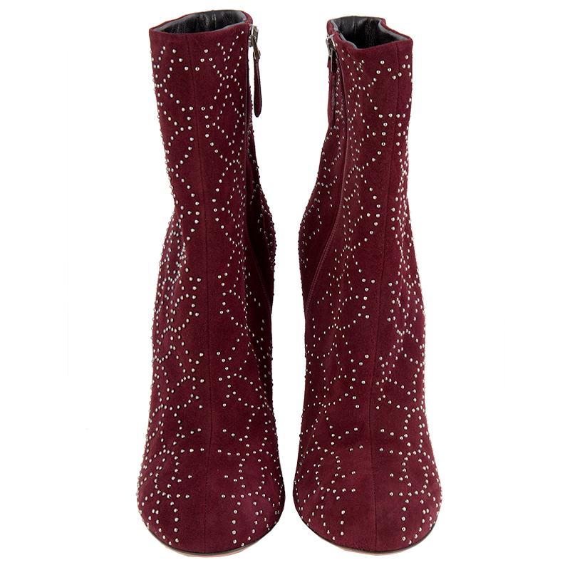 100% authentic Alaïa studded booties in dark burgundy suede. Open with a zipper on the inside. Lined in black leather. Brand new. Come with dust bag.

Imprinted Size	40.5
Shoe Size	40.5
Inside Sole	26cm (10.1in)
Width	7.5cm (2.9in)
Heel	14.5cm