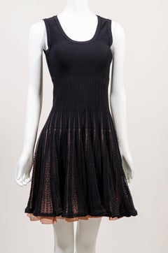 ALAÏA Contemporary knit dress black with peach toned lining / underlay