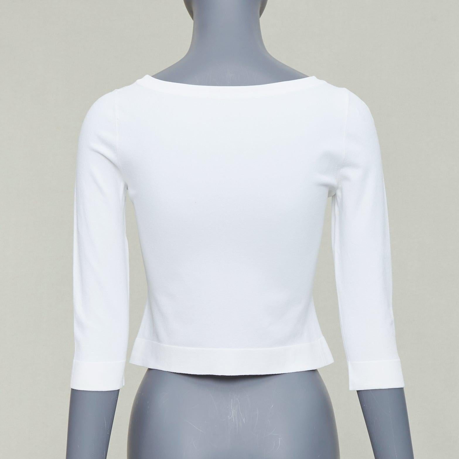De las mujeres ALAIA suéter crema con mangas recortadas y cuello barco en venta