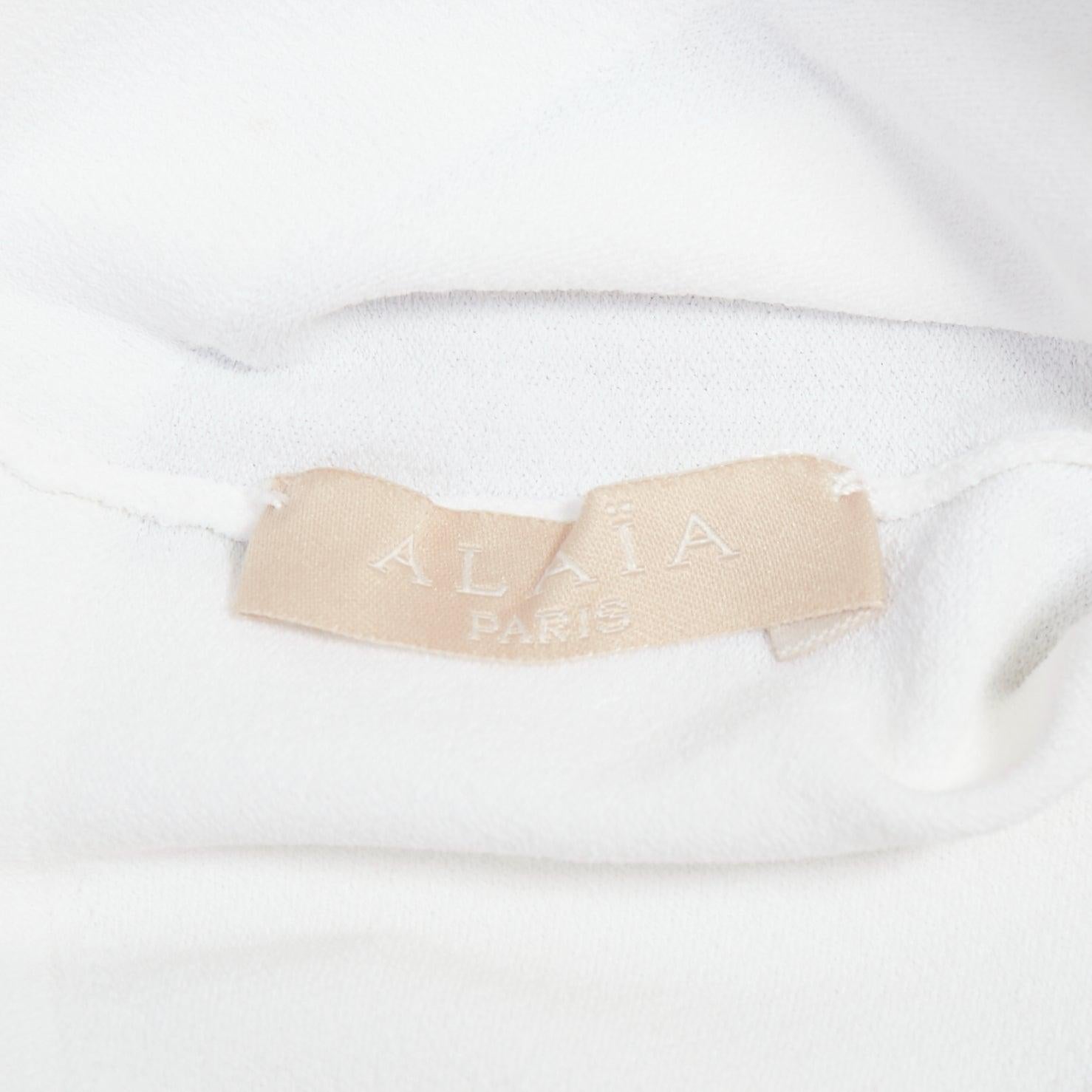 ALAIA suéter crema con mangas recortadas y cuello barco en venta 3