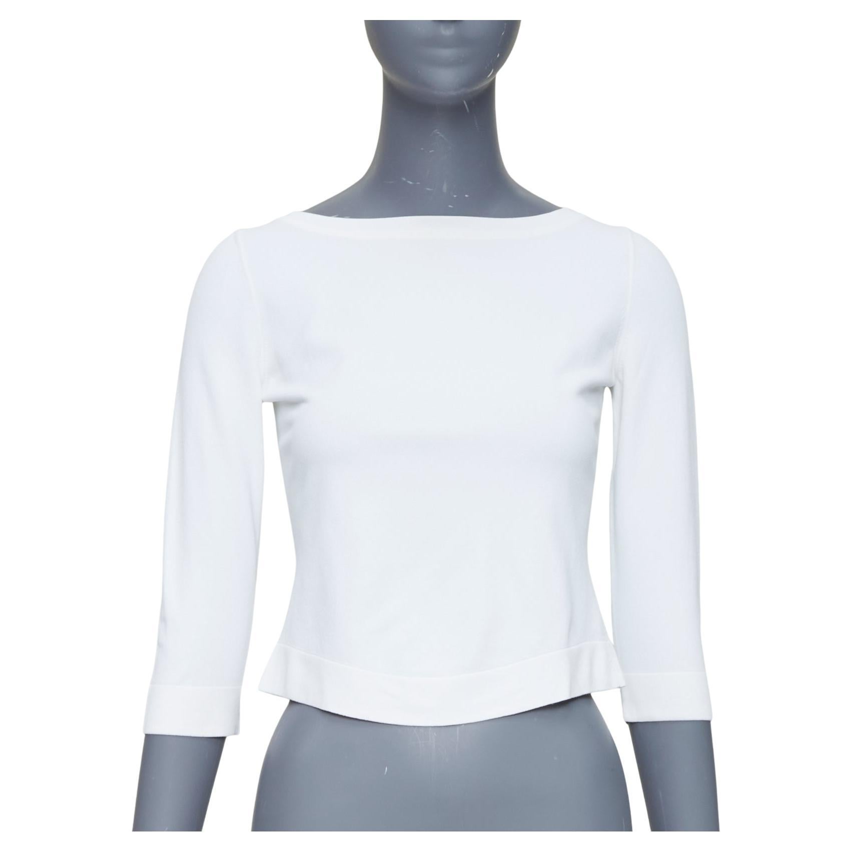 ALAIA suéter crema con mangas recortadas y cuello barco en venta