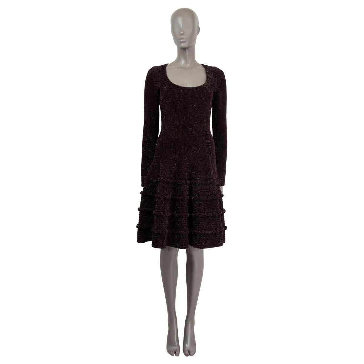100% authentic Alaïa long-sleeve flared dress in brown wool (41%), nylon (28%) and viscose (25%). Features black lurex threads and ruffled hemline. Closes with invisible zipper on the back. Unlined. Has been worn and is in excellent condition.