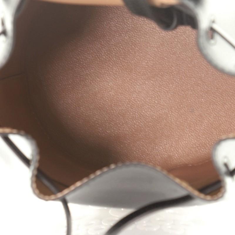 Black Alaia Drawstring Bucket Bag Grommet Embellished Leather Mini