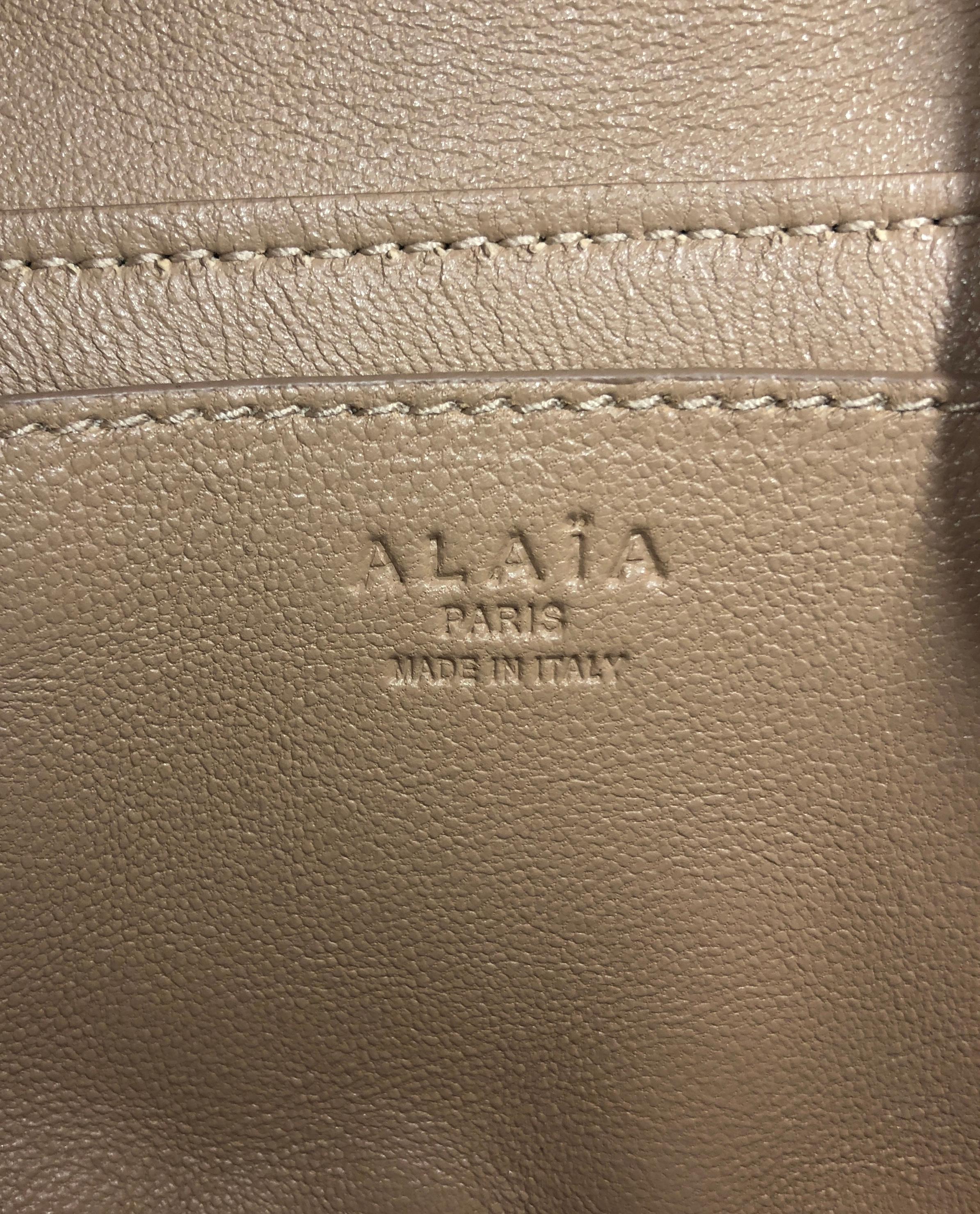 Alaia Drawstring Bucket Bag Grommet Embellished Leather Mini In Good Condition In NY, NY