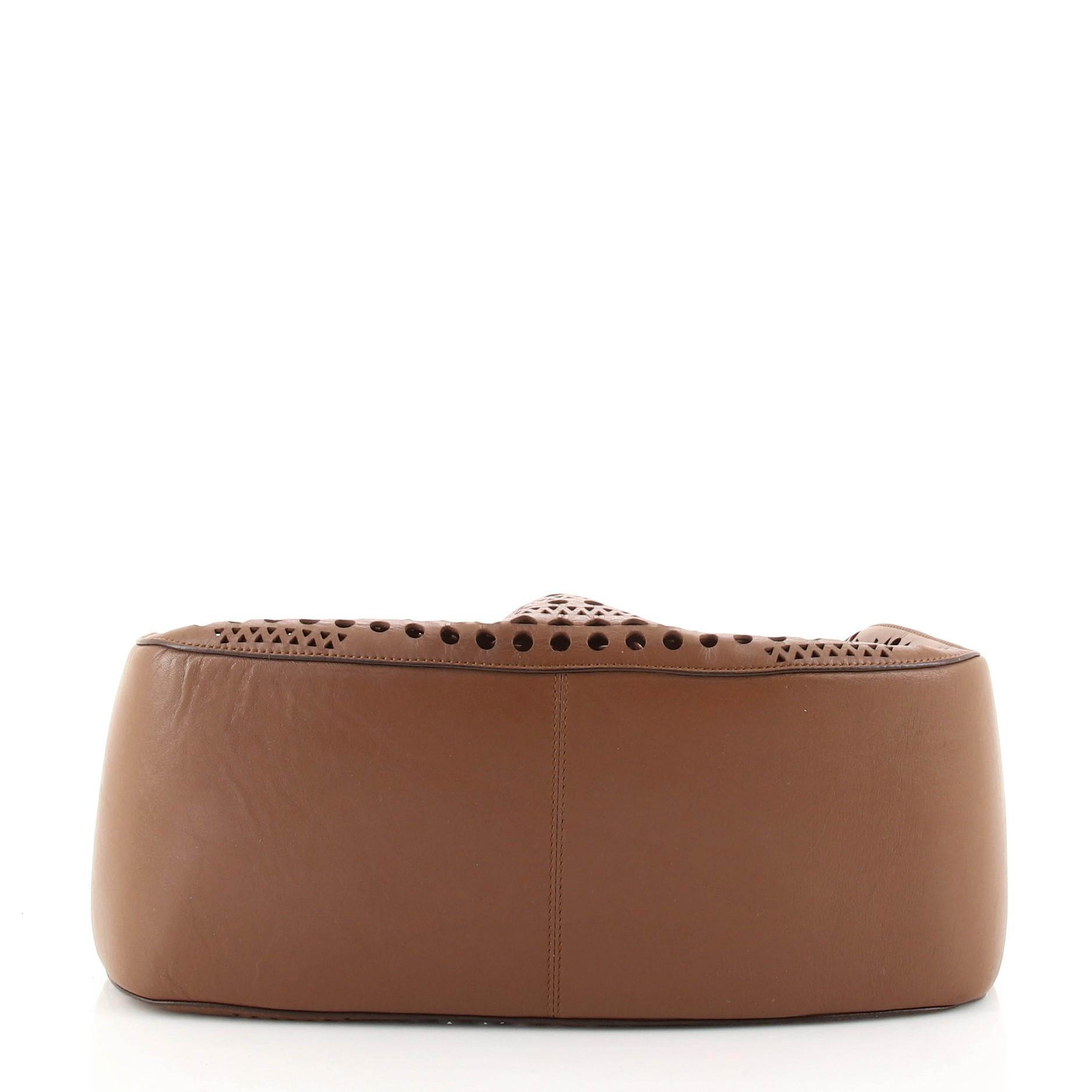 Femenino o masculino Bolso bandolera Alaia con cordón Piel perforada Mediano