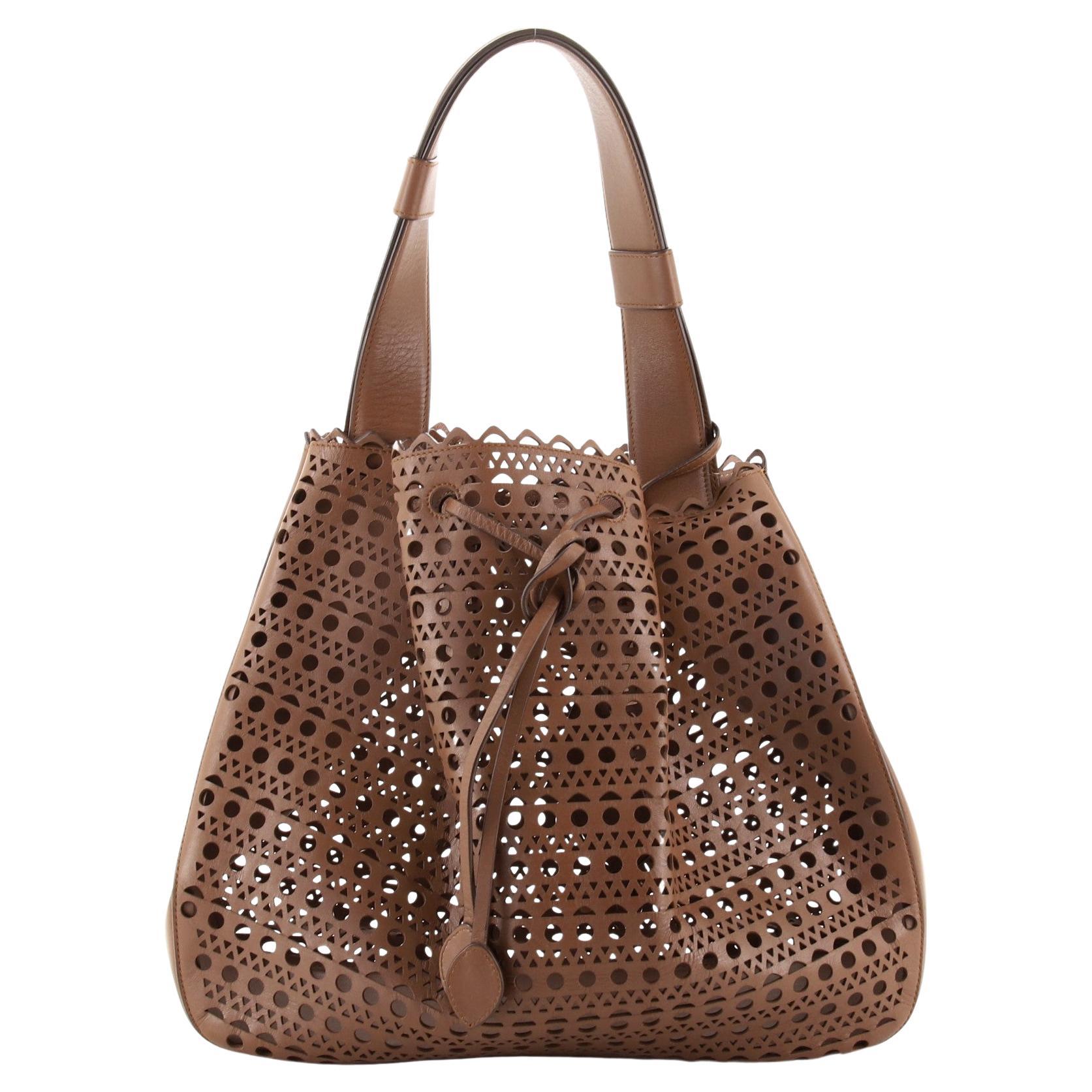 Bolso bandolera Alaia con cordón Piel perforada Mediano